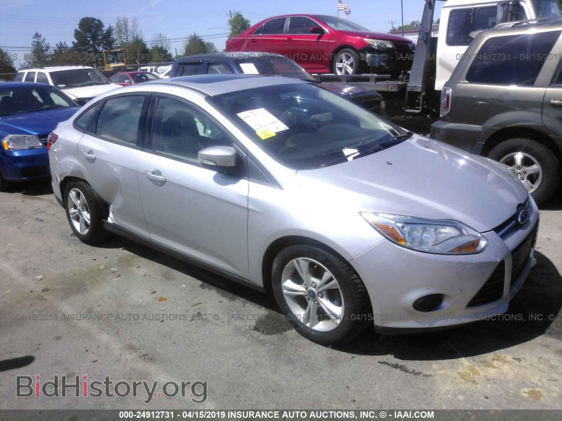 Фотография 1FADP3F26EL409798 - FORD FOCUS 2014