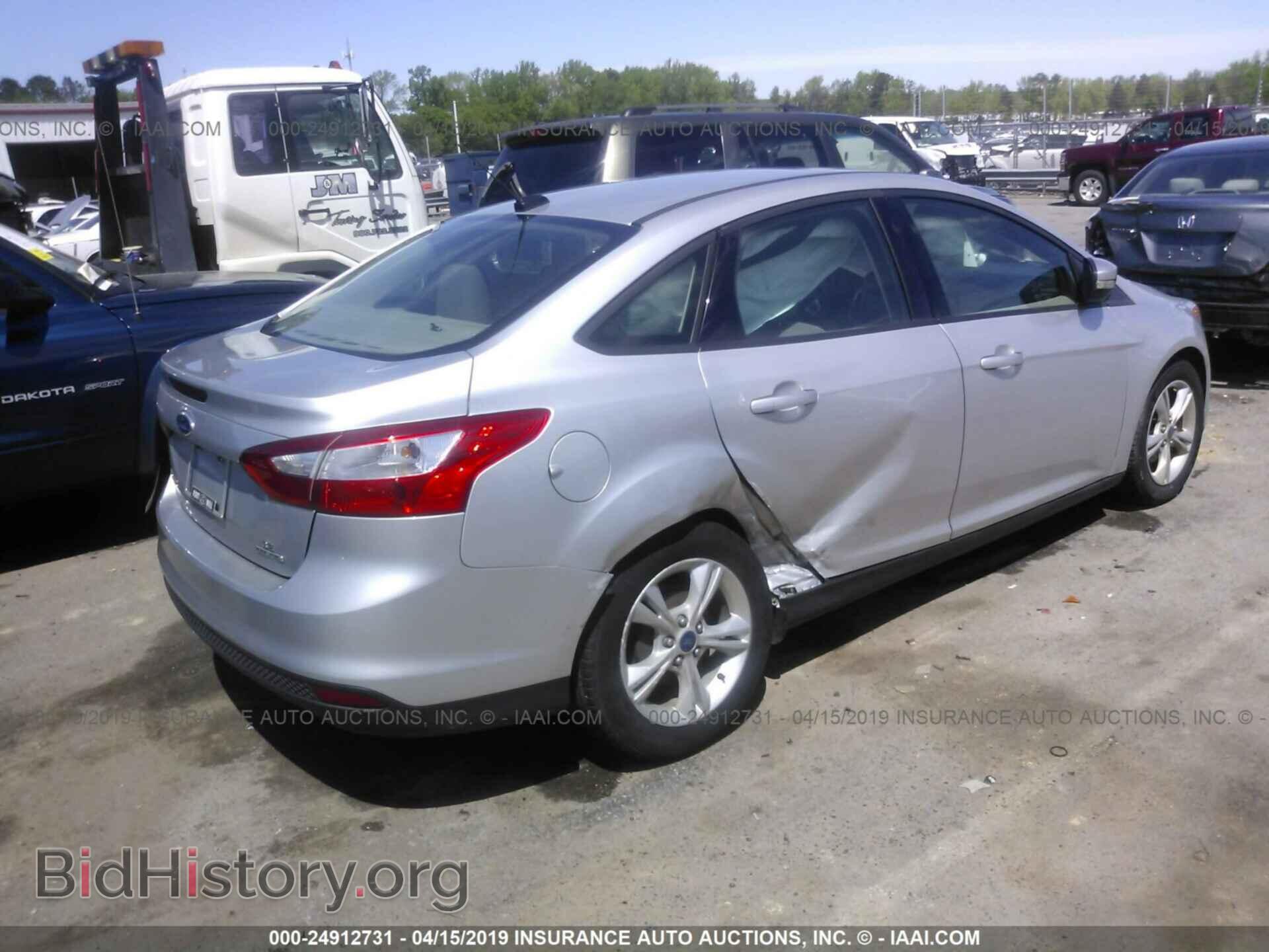 2014 FORD FOCUS - VIN: 1FADP3F26EL409798 - Photo 4