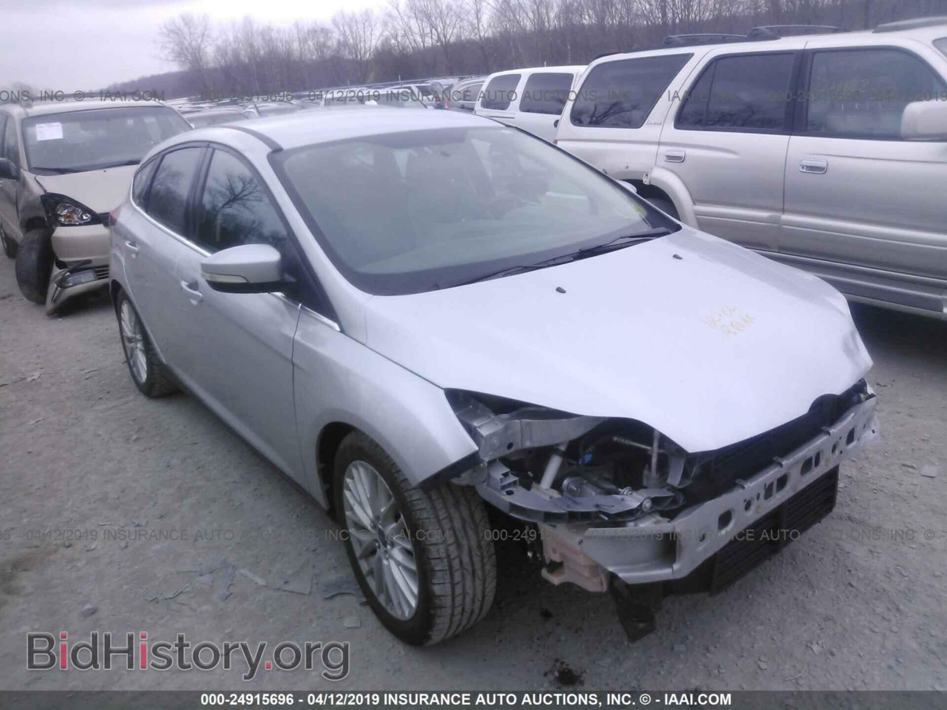 Фотография 1FADP3N25EL338451 - FORD FOCUS 2014