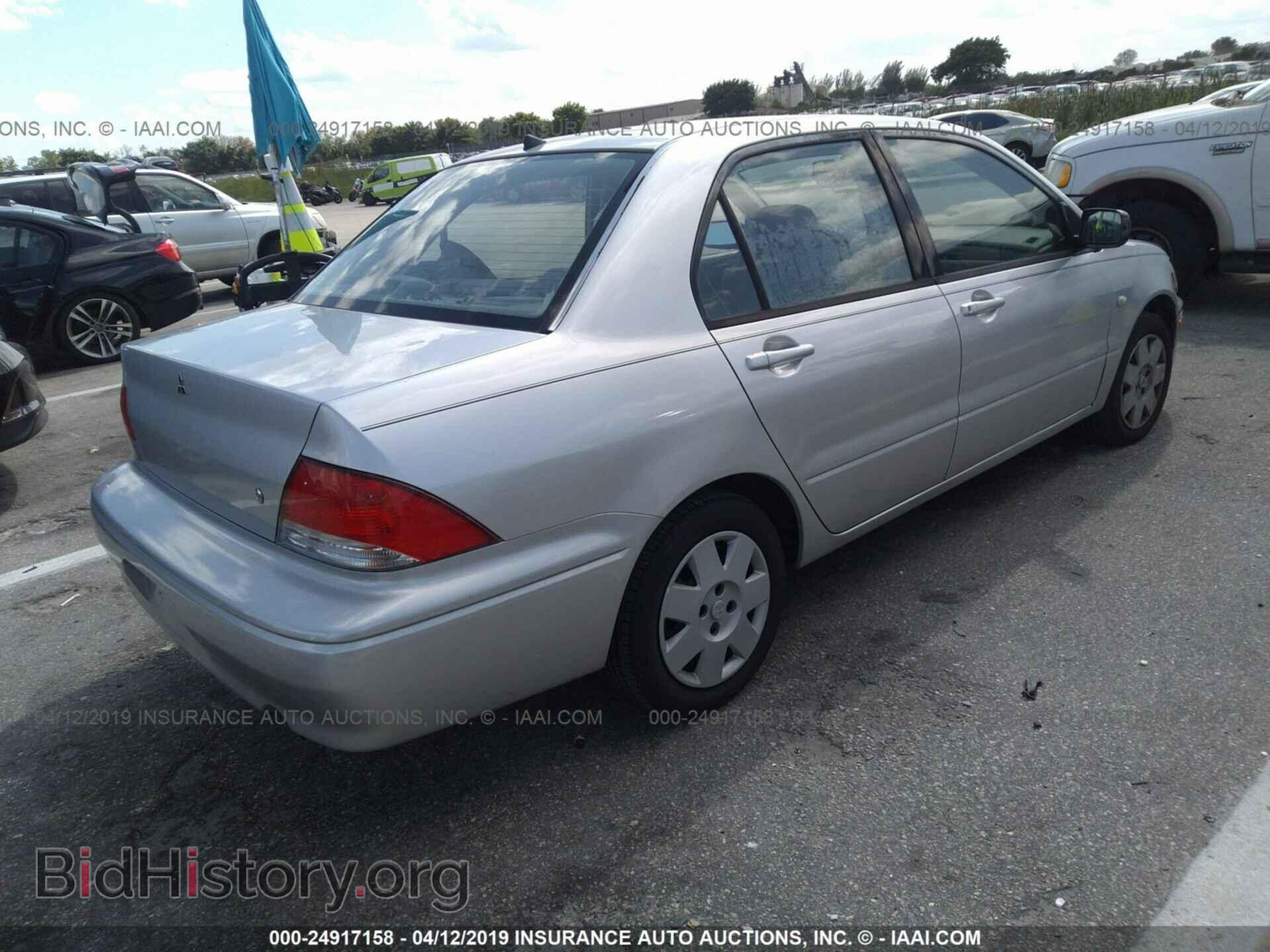 2002 MITSUBISHI LANCER - VIN: JA3AJ26E52U012574 - Photo 4