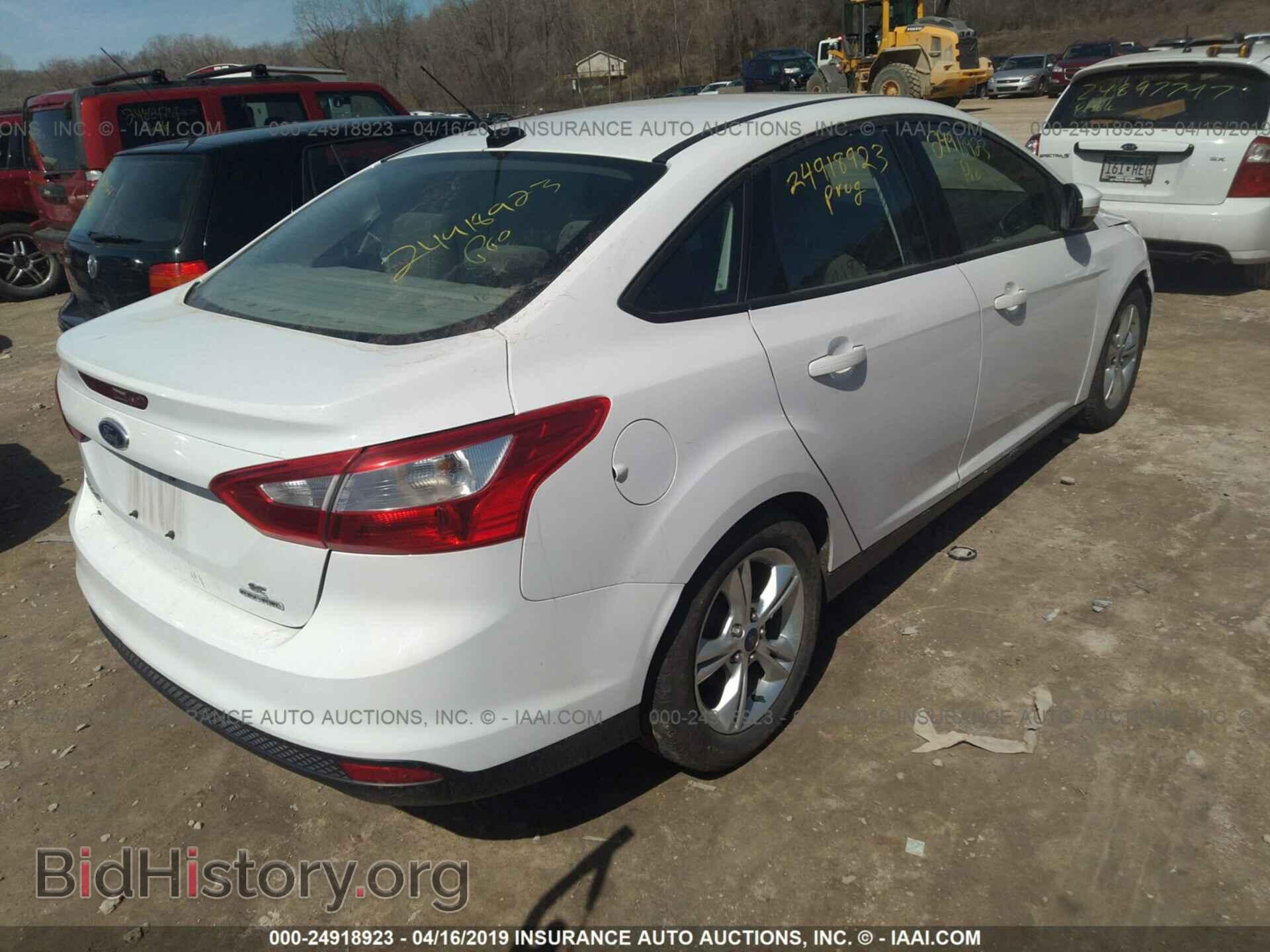 2014 FORD FOCUS - VIN: 1FADP3F27EL301030 - Photo 4