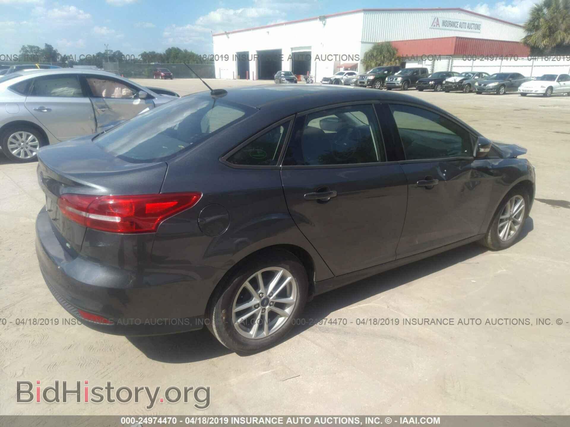 2017 FORD FOCUS - VIN: 1FADP3F23HL309548 - Photo 4