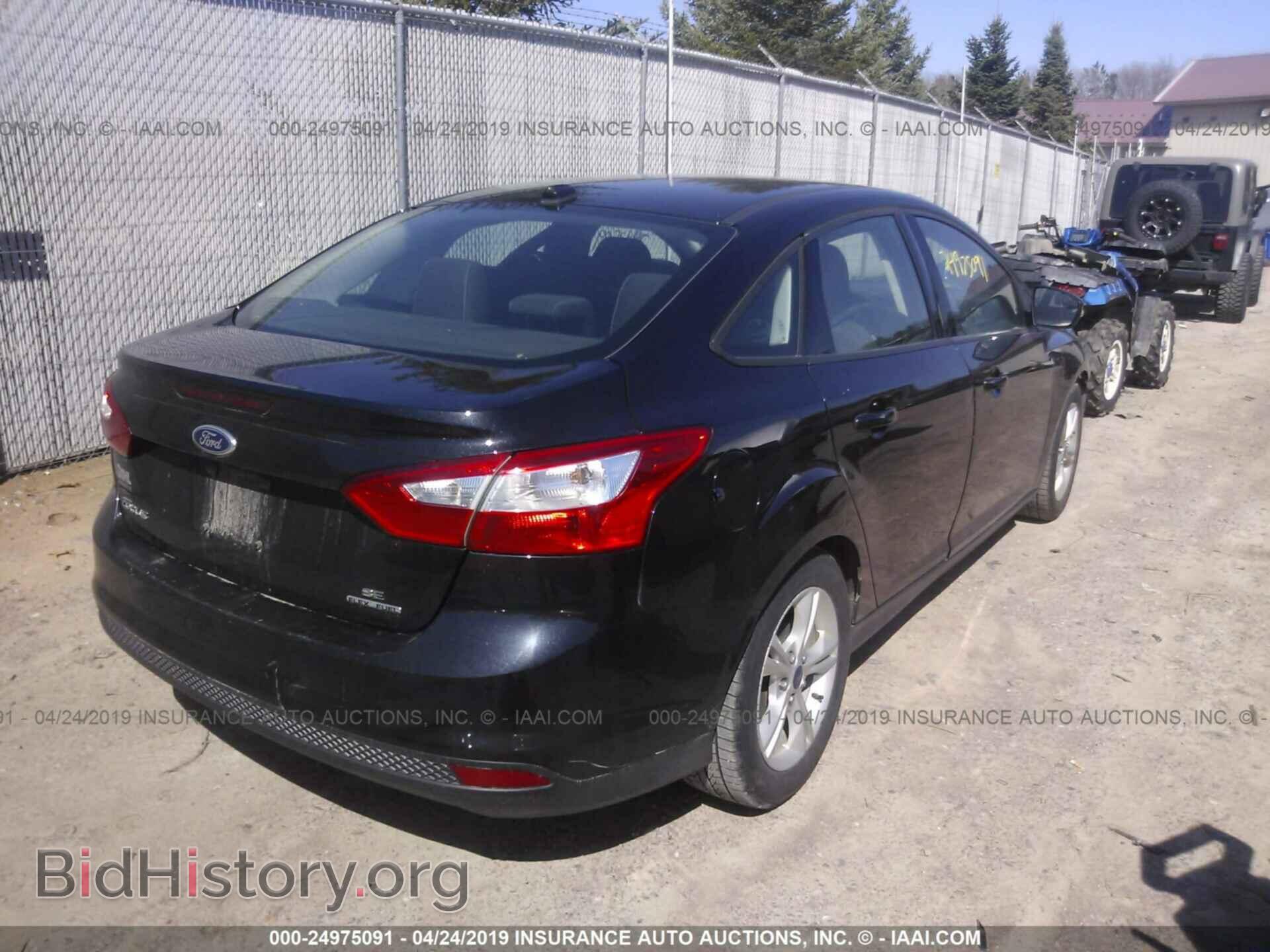2014 FORD FOCUS - VIN: 1FADP3F27EL453048 - Photo 4