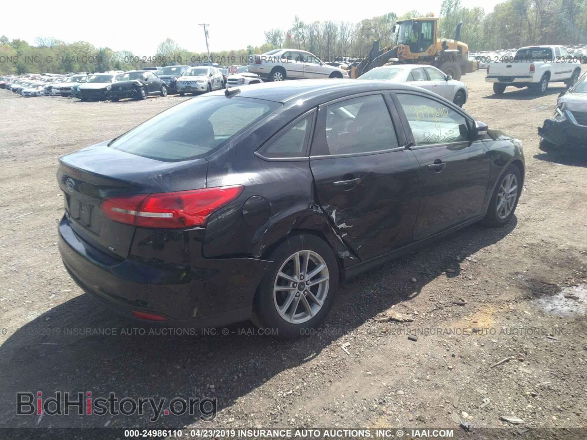 2015 FORD FOCUS - VIN: 1FADP3F26FL215824 - Photo 4