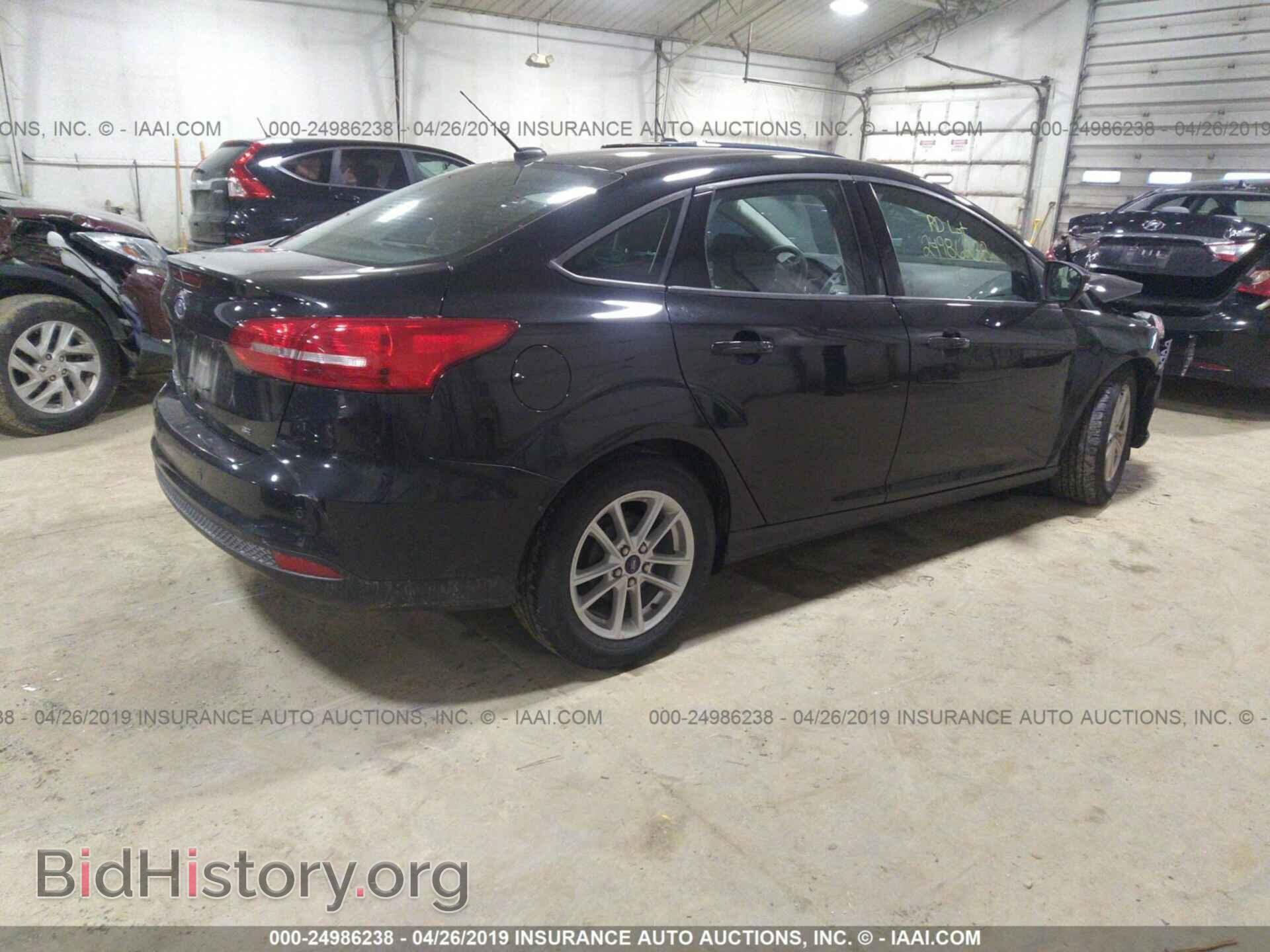 2015 FORD FOCUS - VIN: 1FADP3F29FL273734 - Photo 4