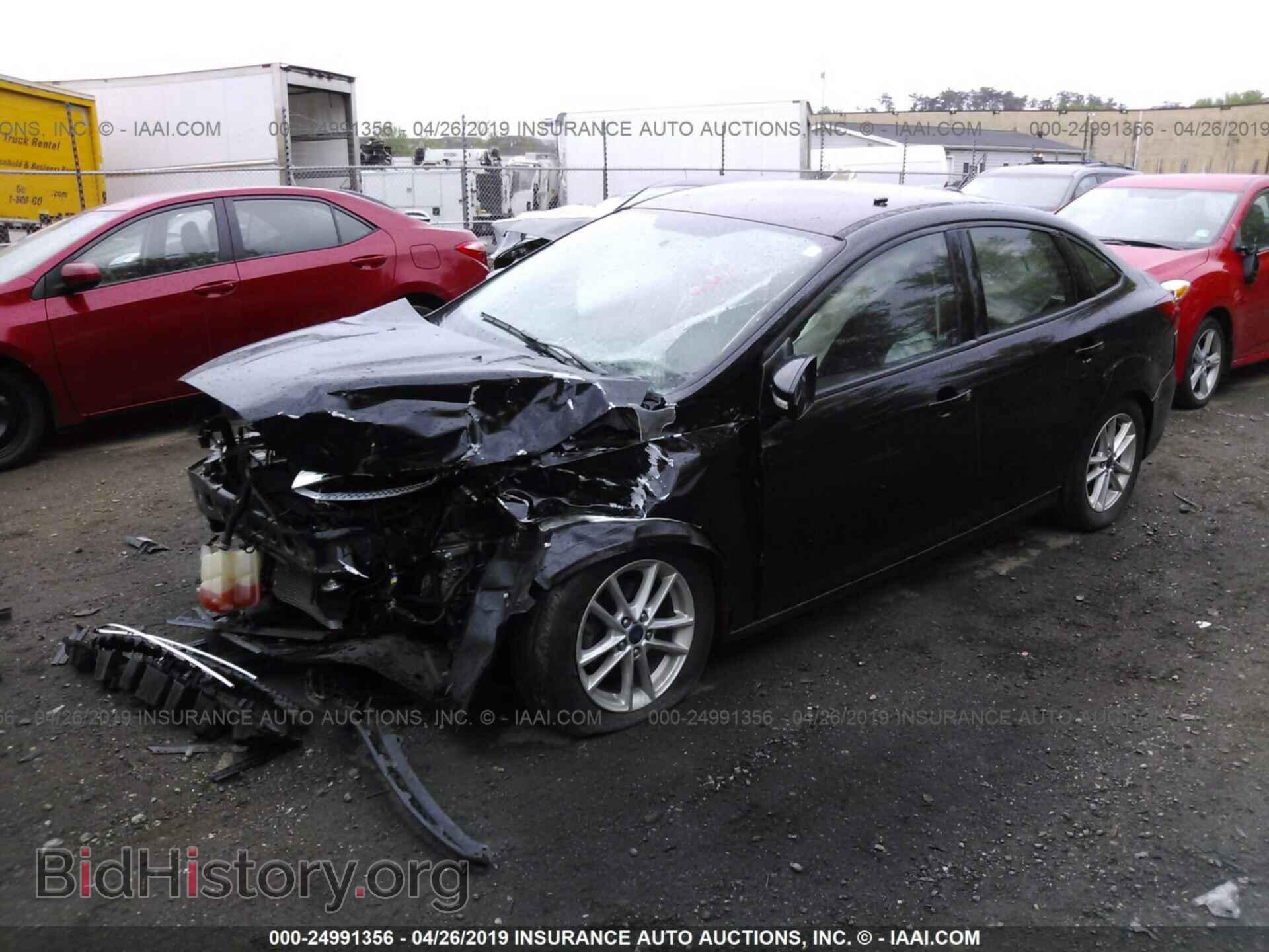 2016 FORD FOCUS - VIN: 1FADP3F29GL382275 - Photo 2