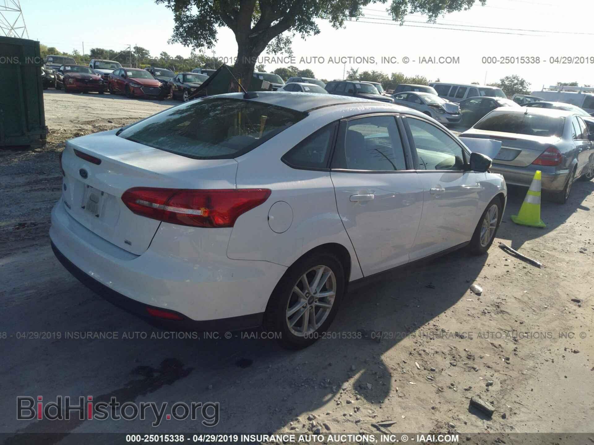 2017 FORD FOCUS - VIN: 1FADP3F21HL322816 - Photo 4