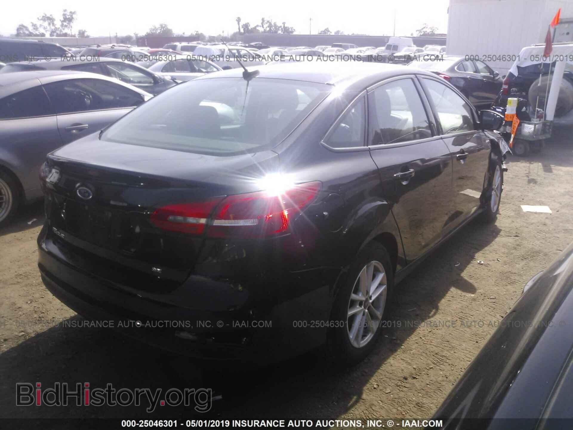 2016 FORD FOCUS - VIN: 1FADP3F24GL405719 - Photo 4