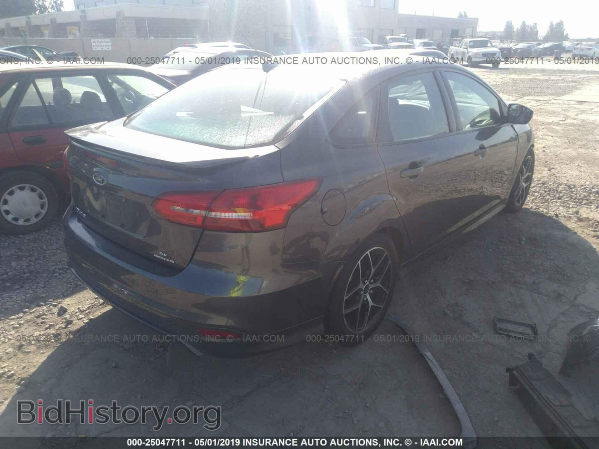 2015 FORD FOCUS - VIN: 1FADP3F20FL281561 - Photo 4