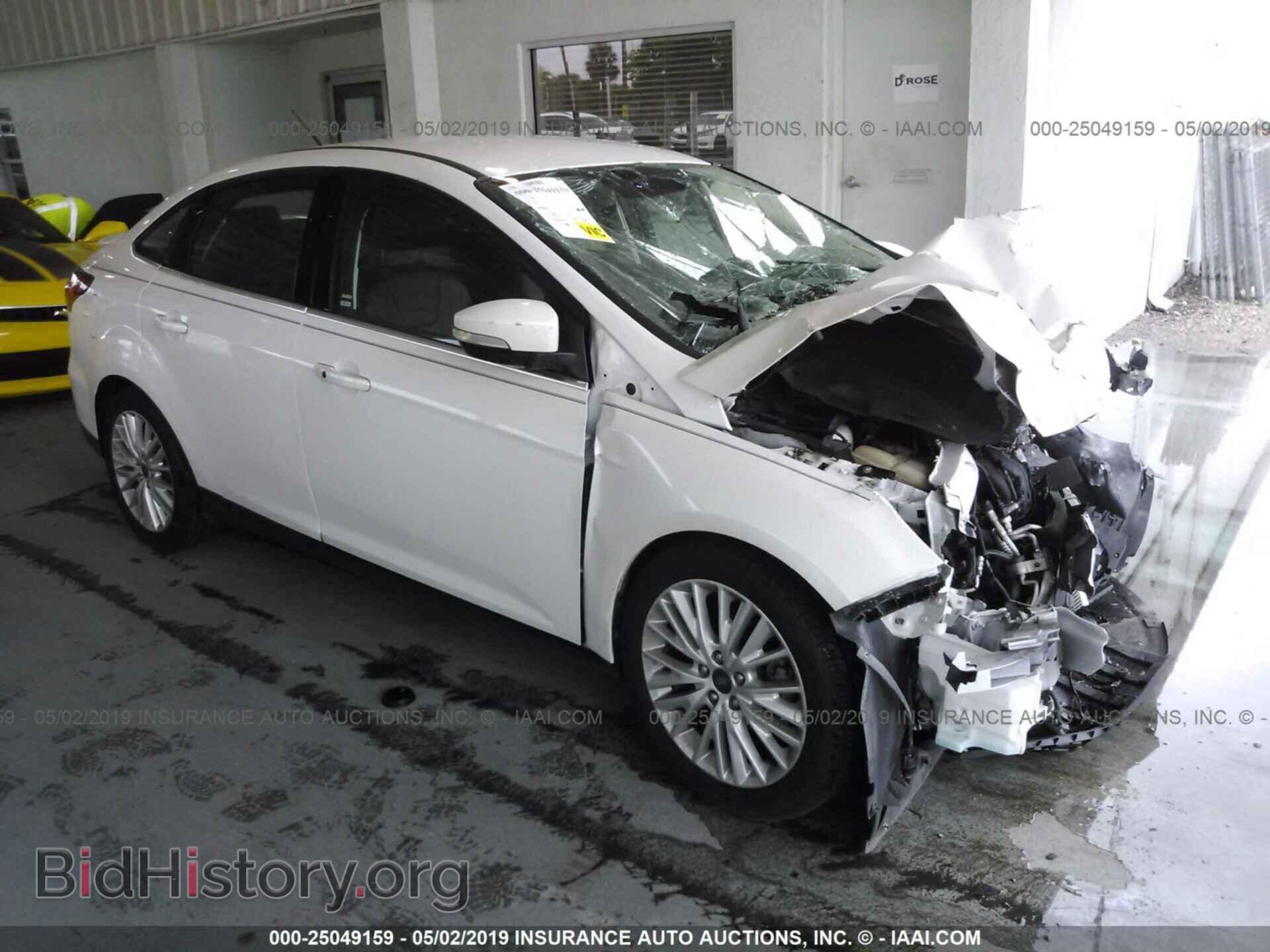 Фотография 1FADP3J29GL318325 - FORD FOCUS 2016