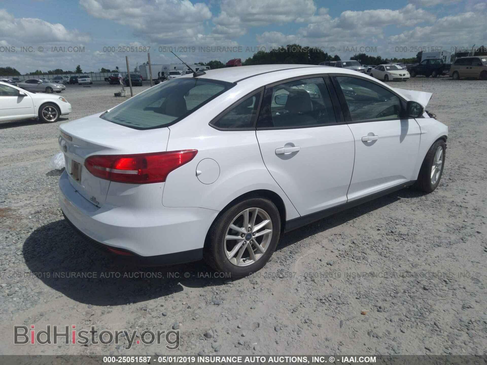2015 FORD FOCUS - VIN: 1FADP3F25FL264108 - Photo 4