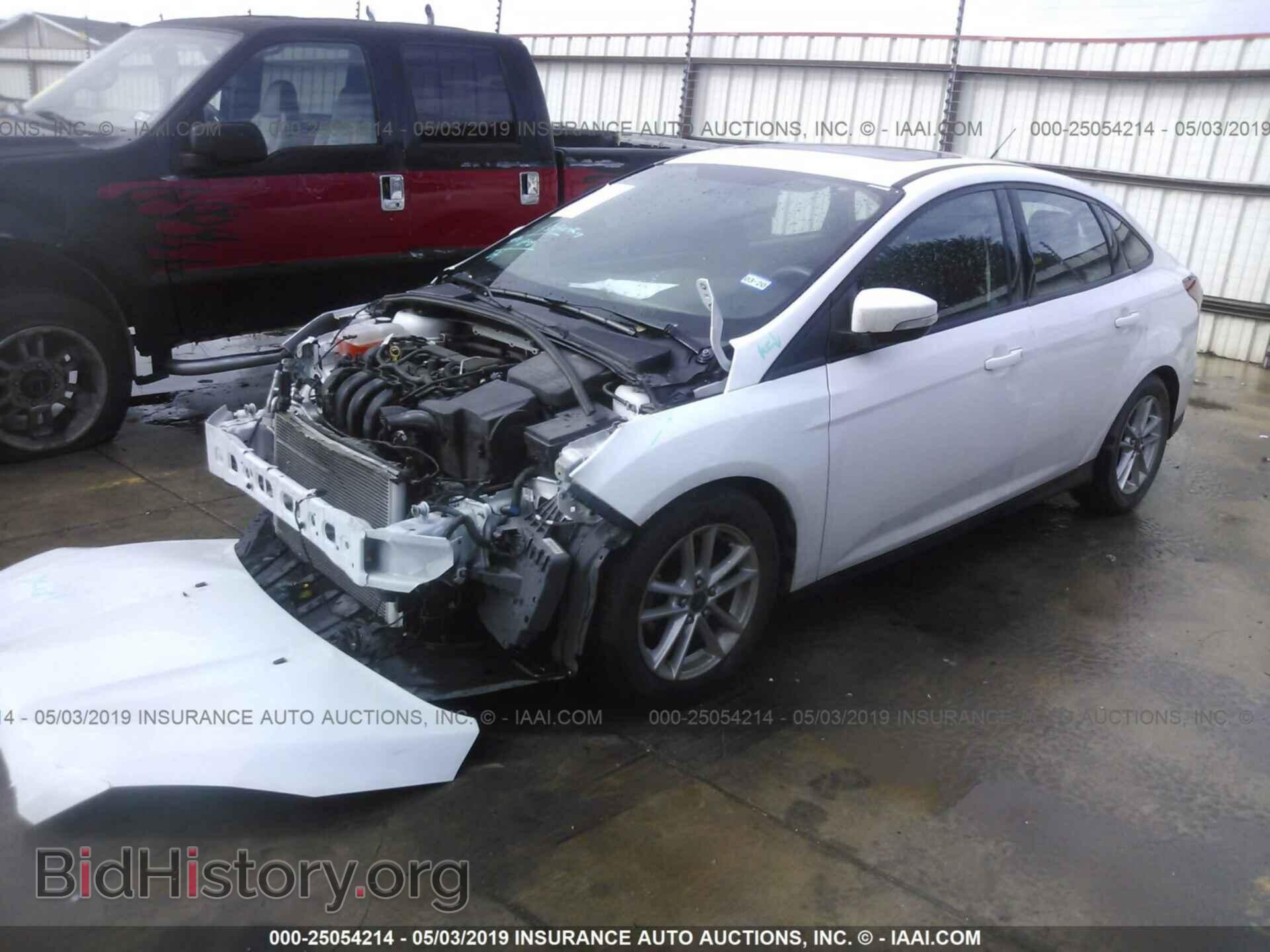 2016 FORD FOCUS - VIN: 1FADP3F23GL272404 - Фото 2