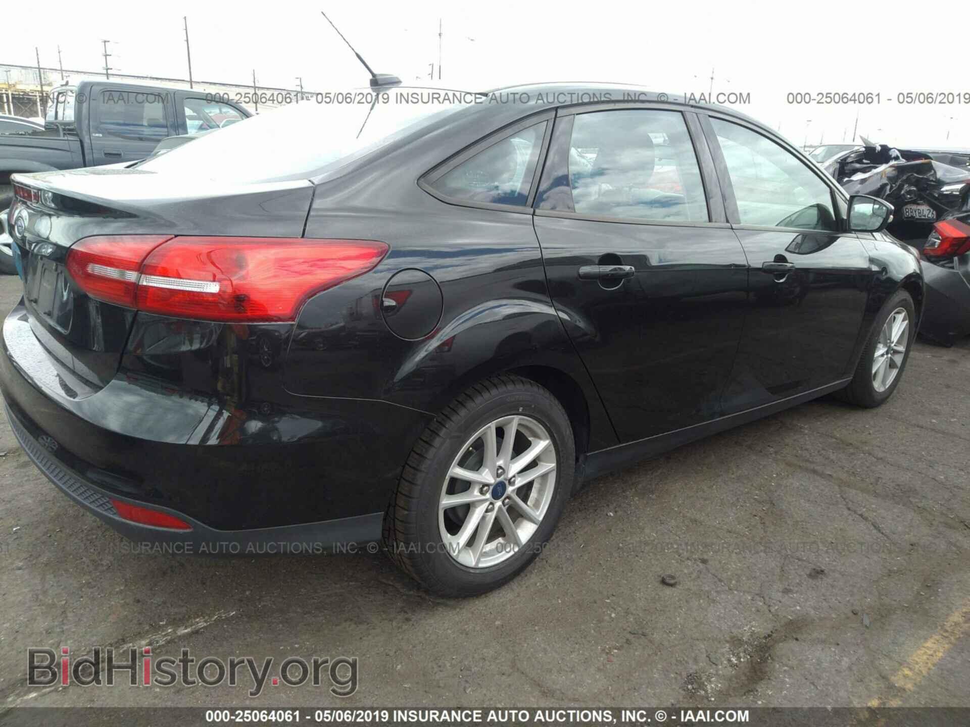 2015 FORD FOCUS - VIN: 1FADP3F27FL329816 - Photo 4