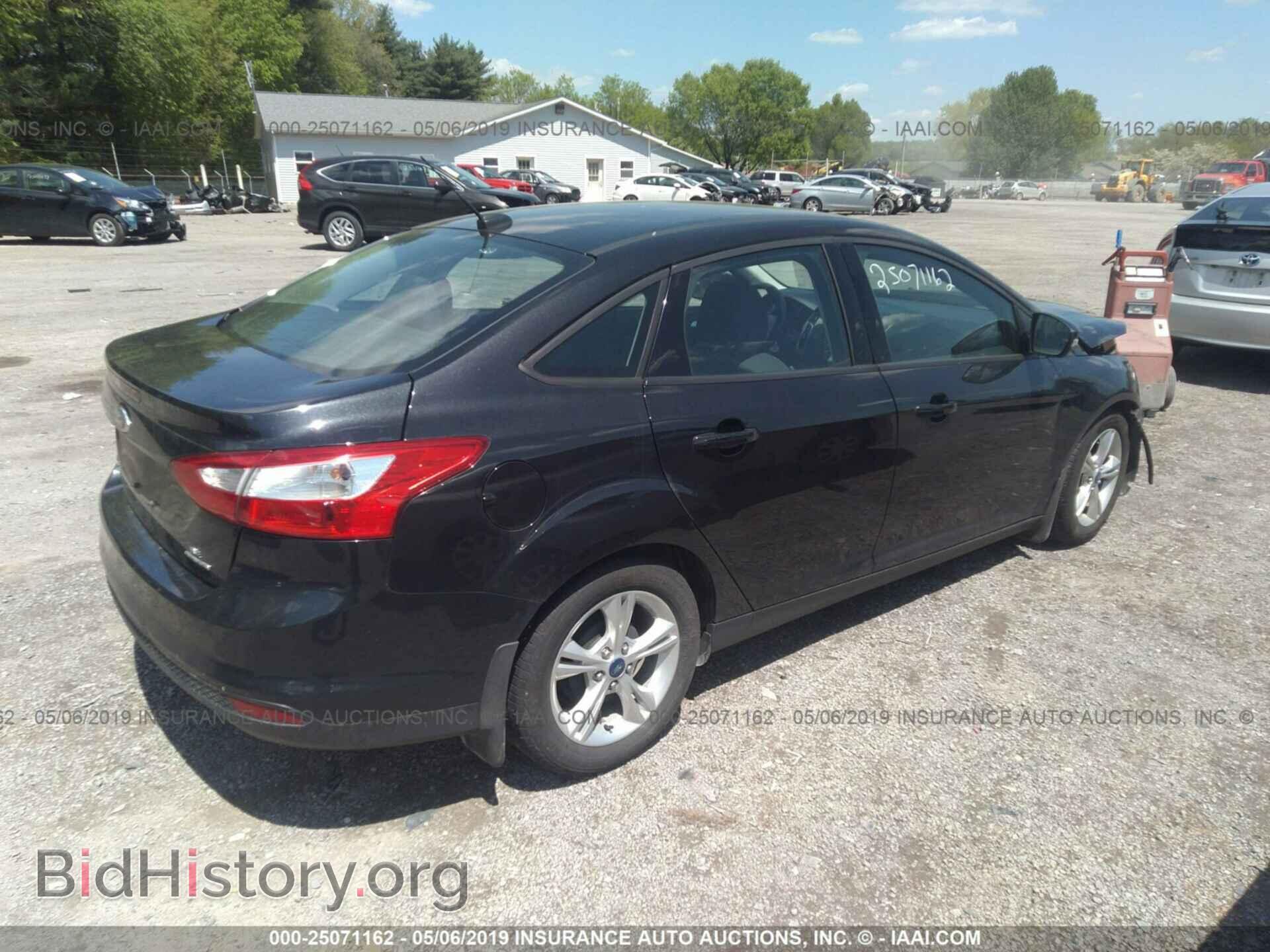 2014 FORD FOCUS - VIN: 1FADP3F2XEL106264 - Photo 4
