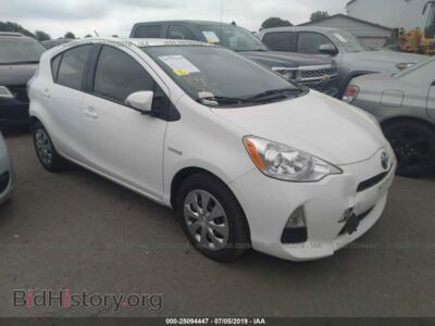 2014 Toyota PRIUS C, белый — VIN JTDKDTB36E1065670, IAAI