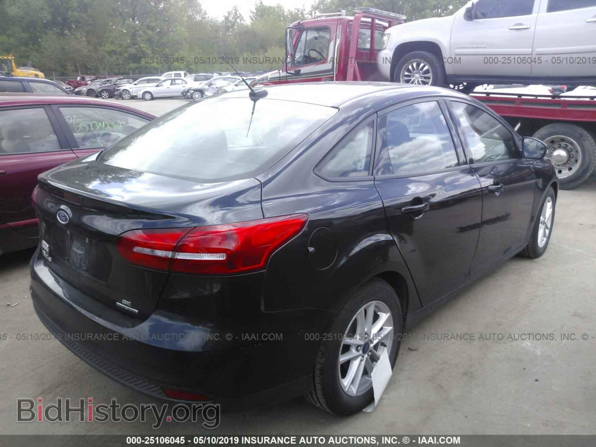2015 FORD FOCUS - VIN: 1FADP3F21FL281004 - Photo 4