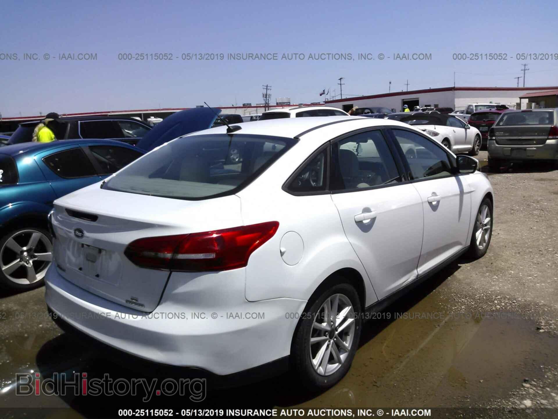 2015 FORD FOCUS - VIN: 1FADP3F20FL350099 - Photo 4