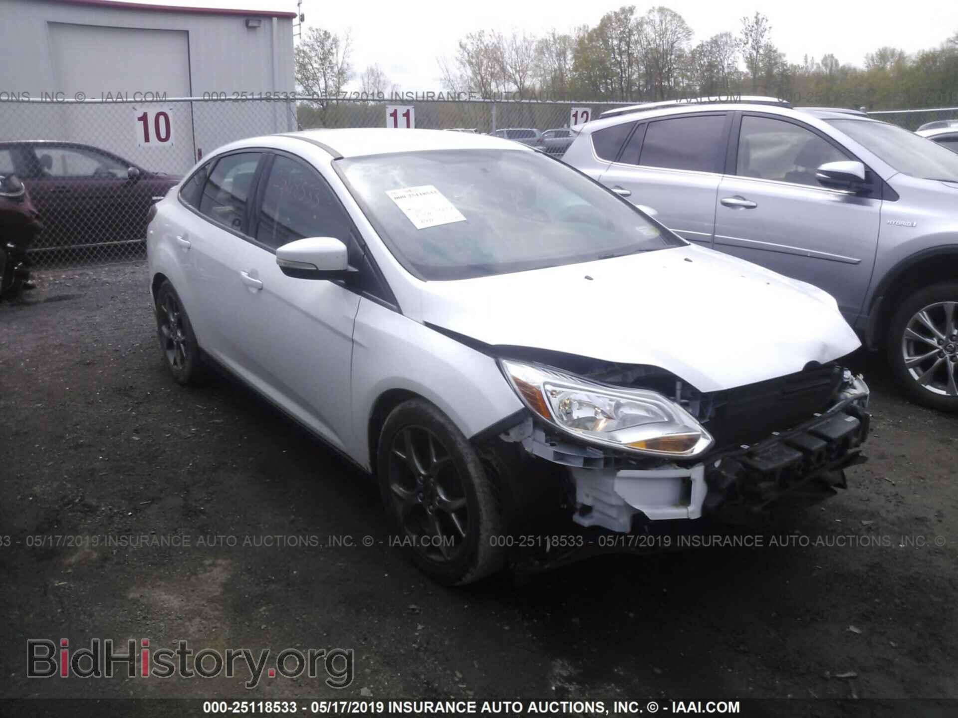 Фотография 1FADP3F26EL243315 - FORD FOCUS 2014