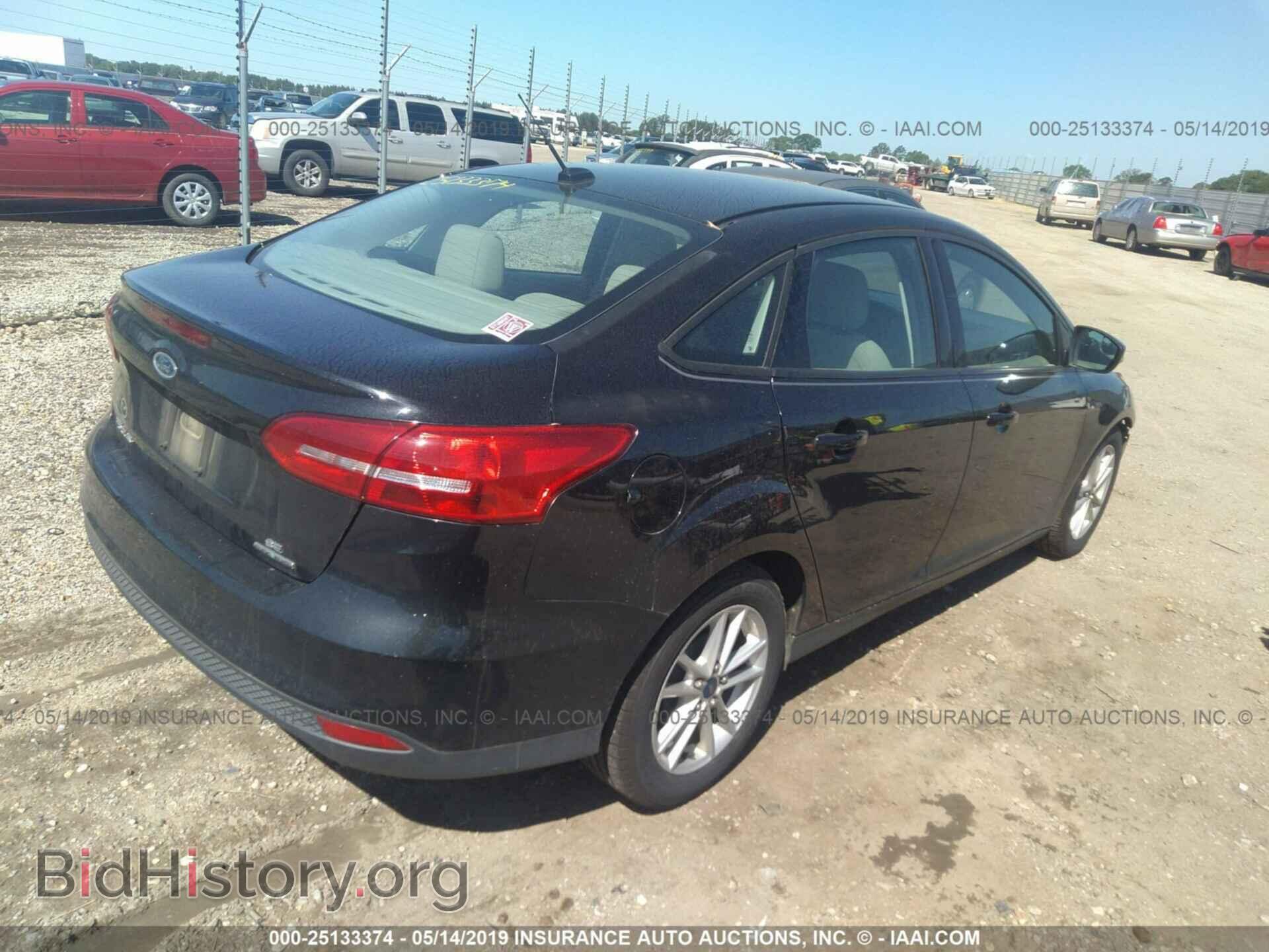 2015 FORD FOCUS - VIN: 1FADP3F22FL328928 - Photo 4