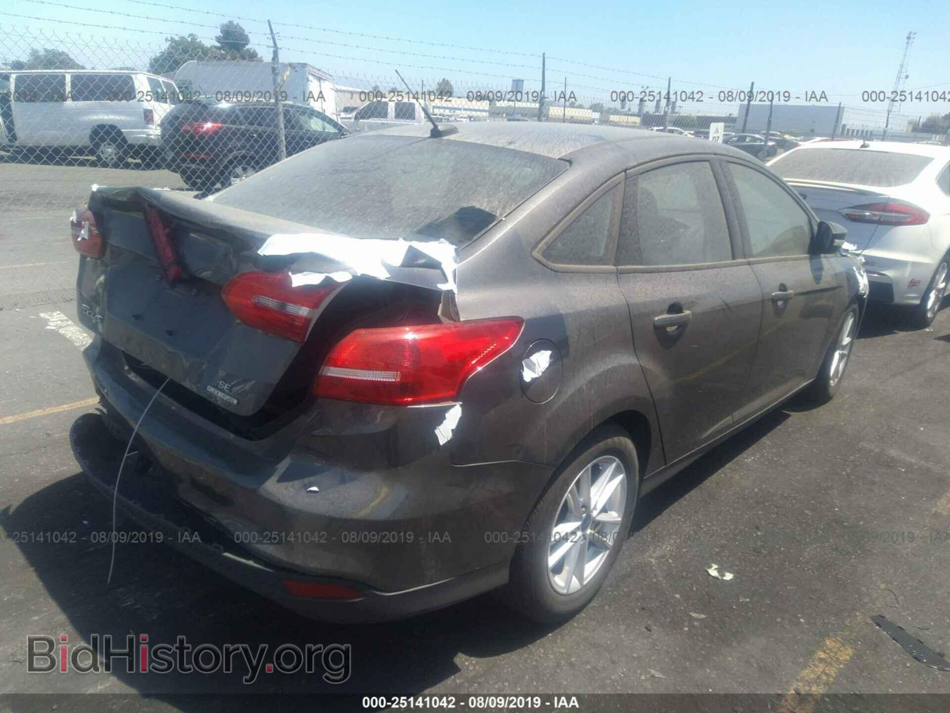 2016 FORD FOCUS - VIN: 1FADP3F21GL280372 - Photo 4