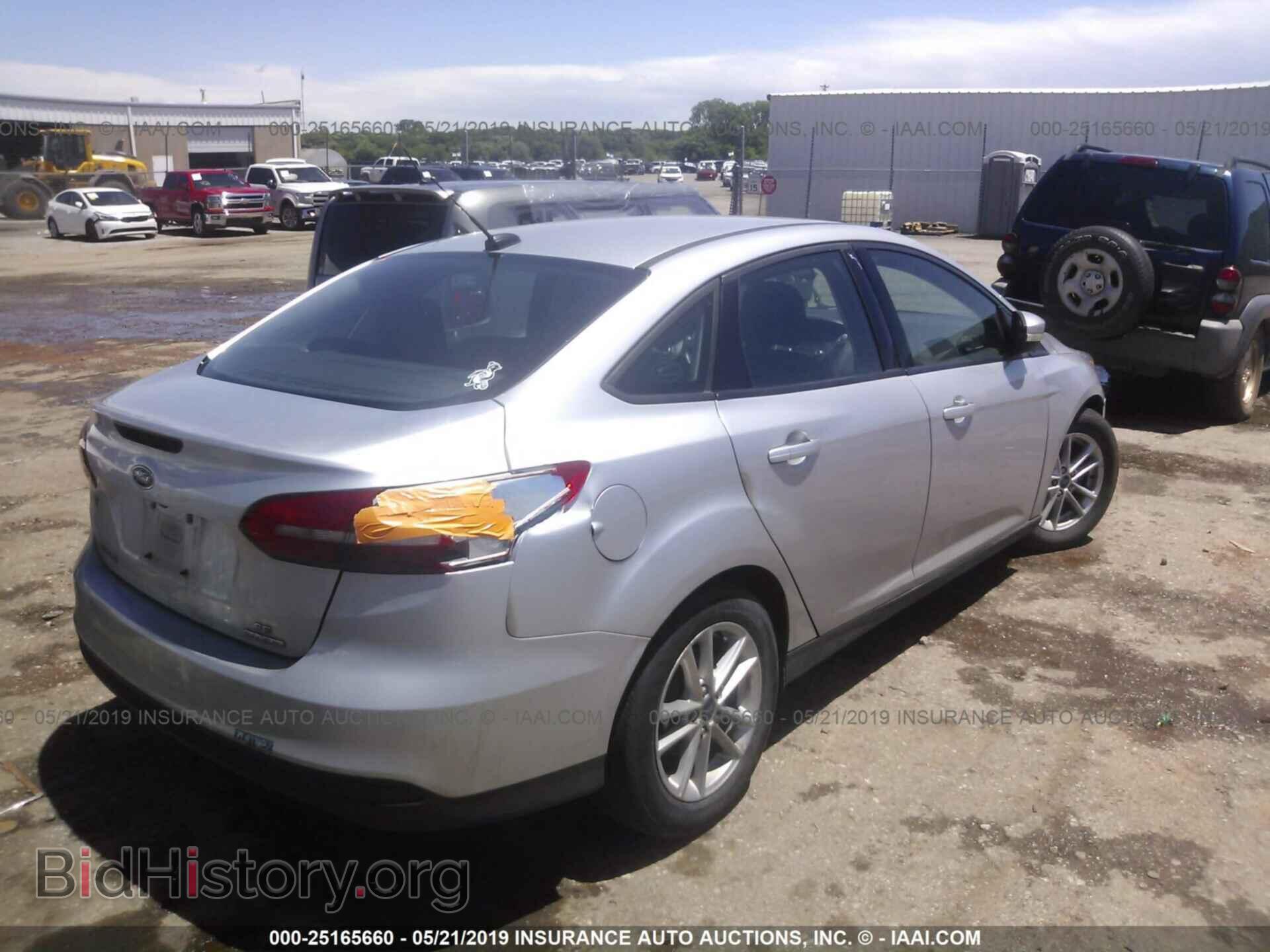 2016 FORD FOCUS - VIN: 1FADP3F27GL285592 - Photo 4