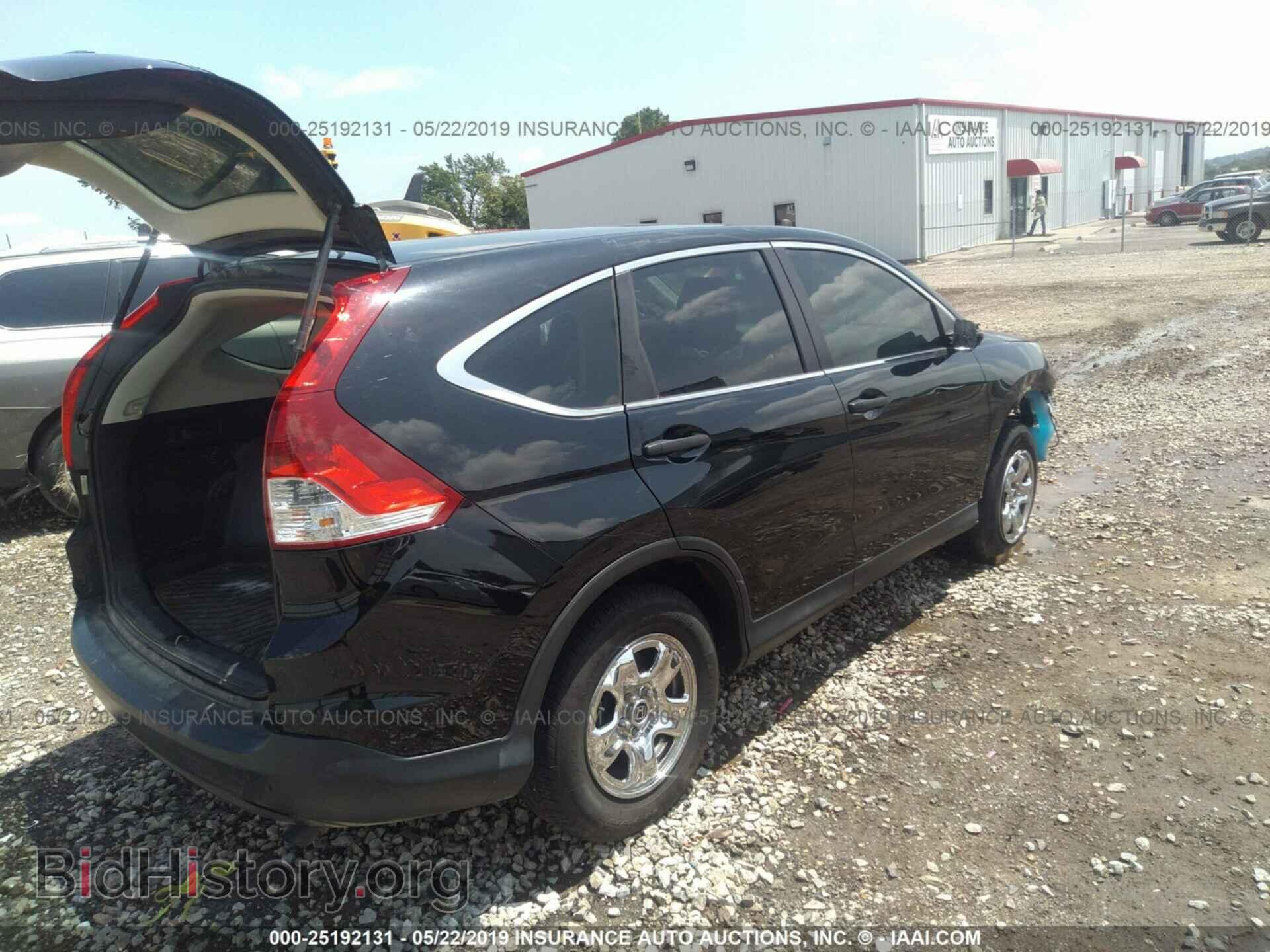 2014 HONDA CR-V - VIN: 2HKRM3H3XEH557553 - Фото 4