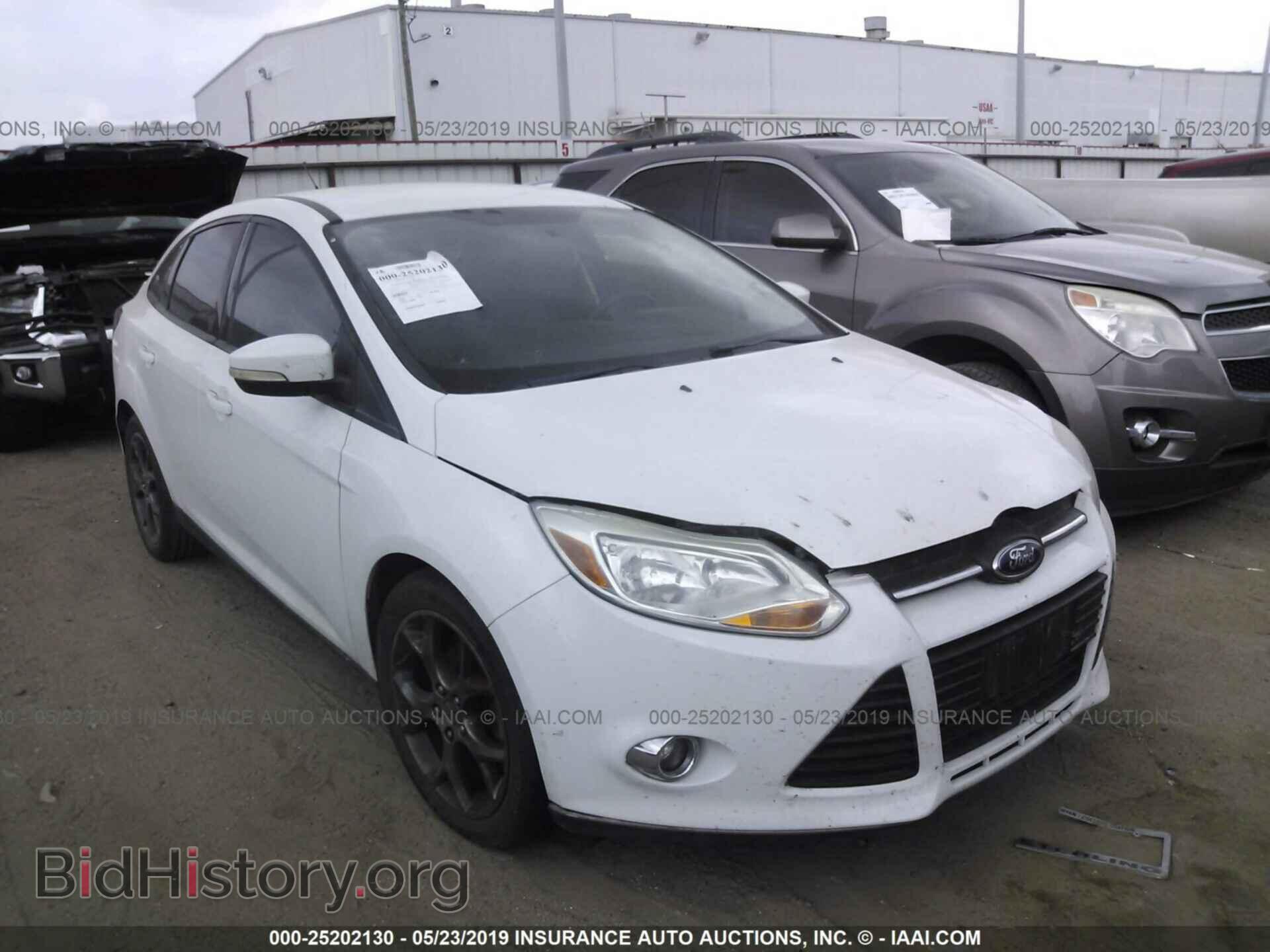 Фотография 1FADP3F29DL200439 - FORD FOCUS 2013