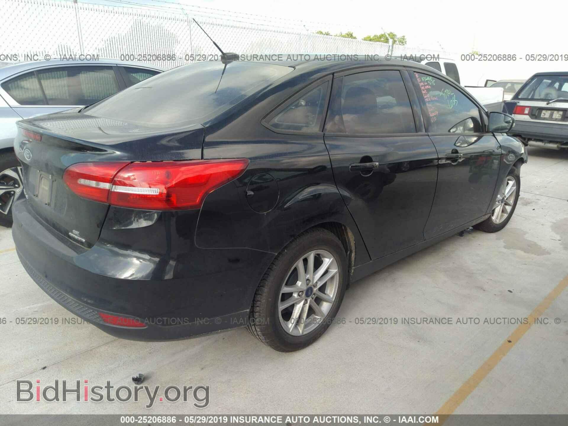 2016 FORD FOCUS - VIN: 1FADP3F27GL305615 - Photo 4