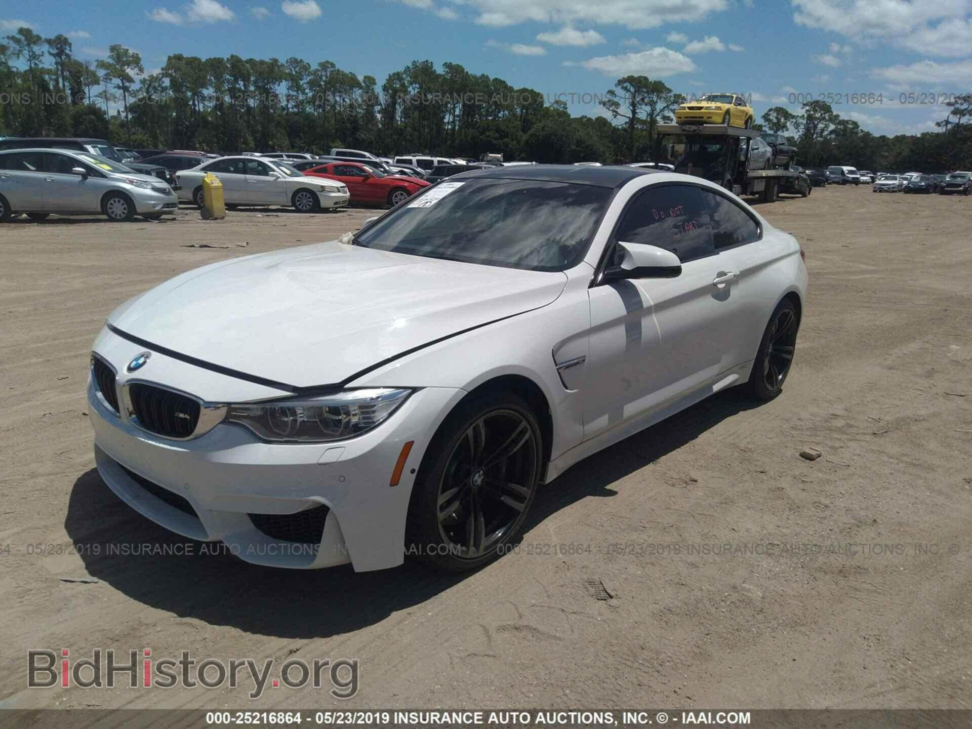 2016 BMW M4 - VIN: WBS3R9C56GK338170 - Фото 2