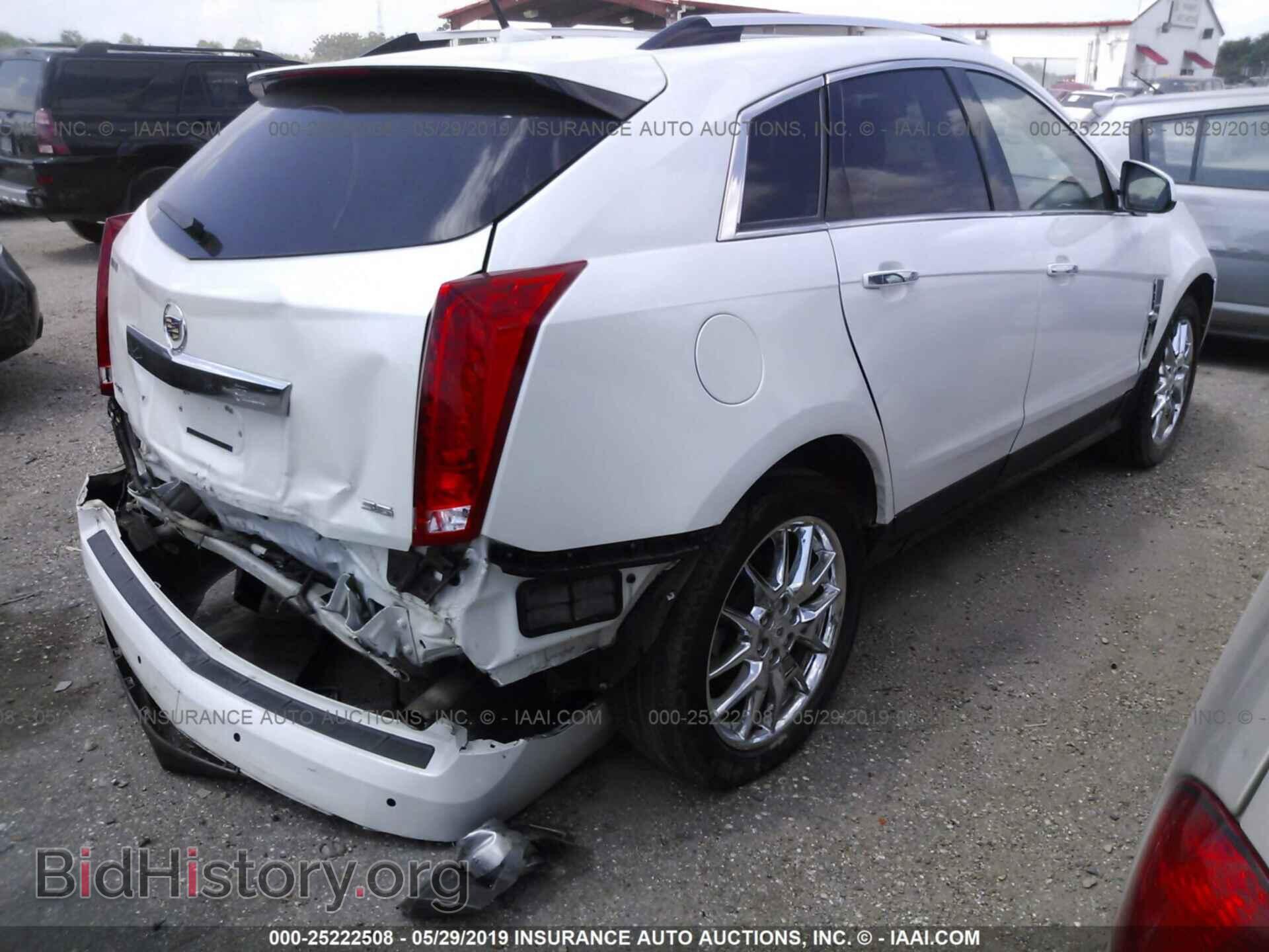 2014 CADILLAC SRX - VIN: 3GYFNCE30ES599184 - Фото 4