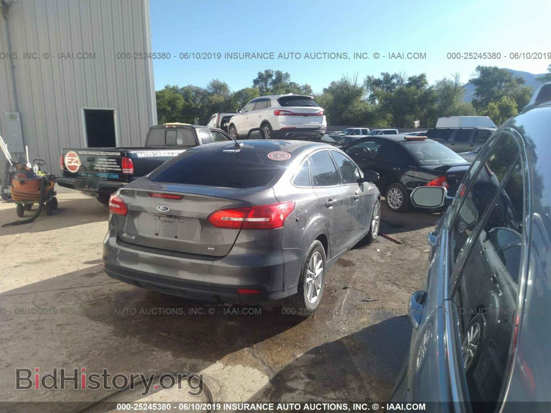 2015 FORD FOCUS - VIN: 1FADP3F23FL343566 - Photo 4