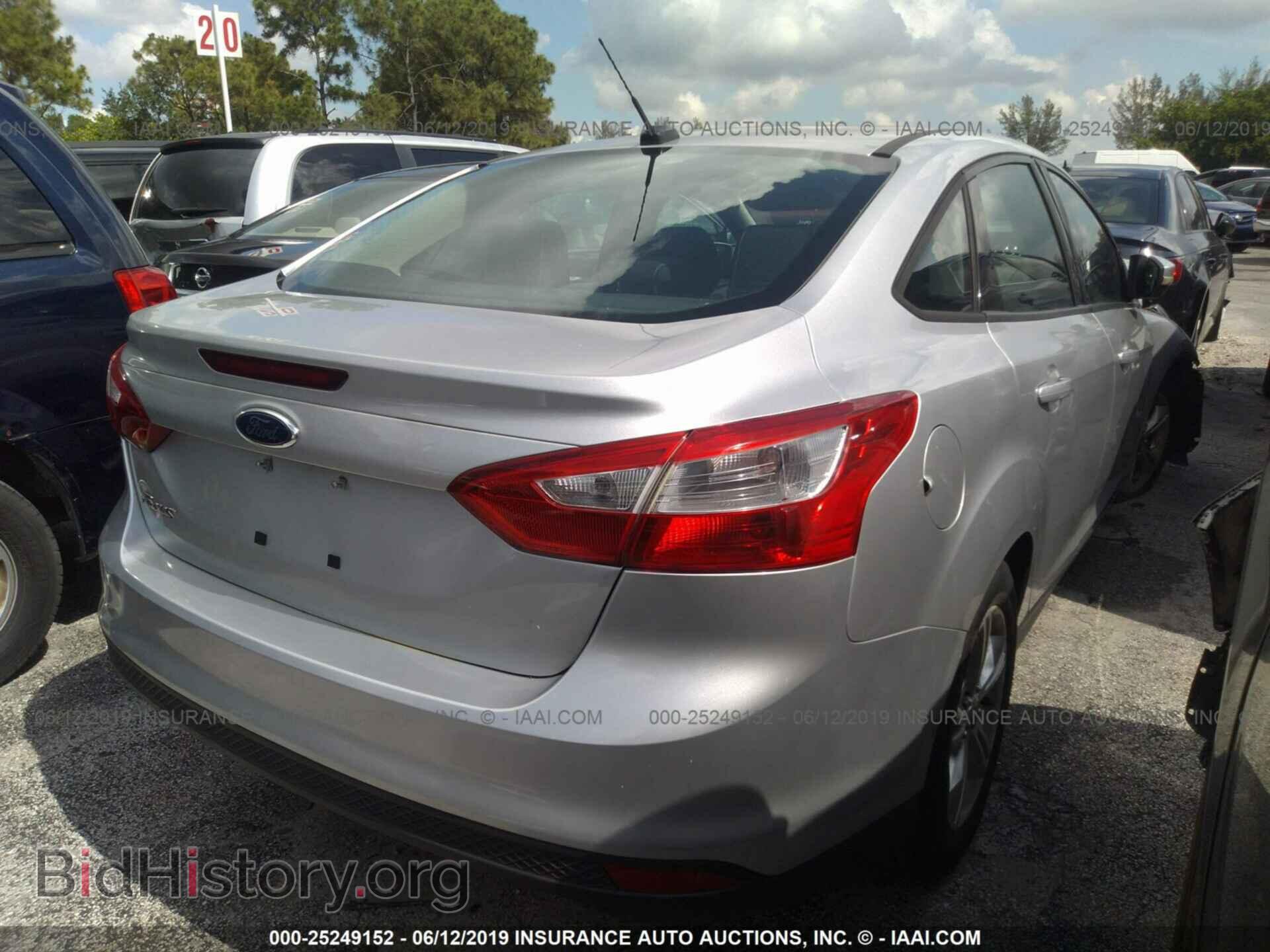 2014 FORD FOCUS - VIN: 1FADP3F29EL301000 - Photo 4
