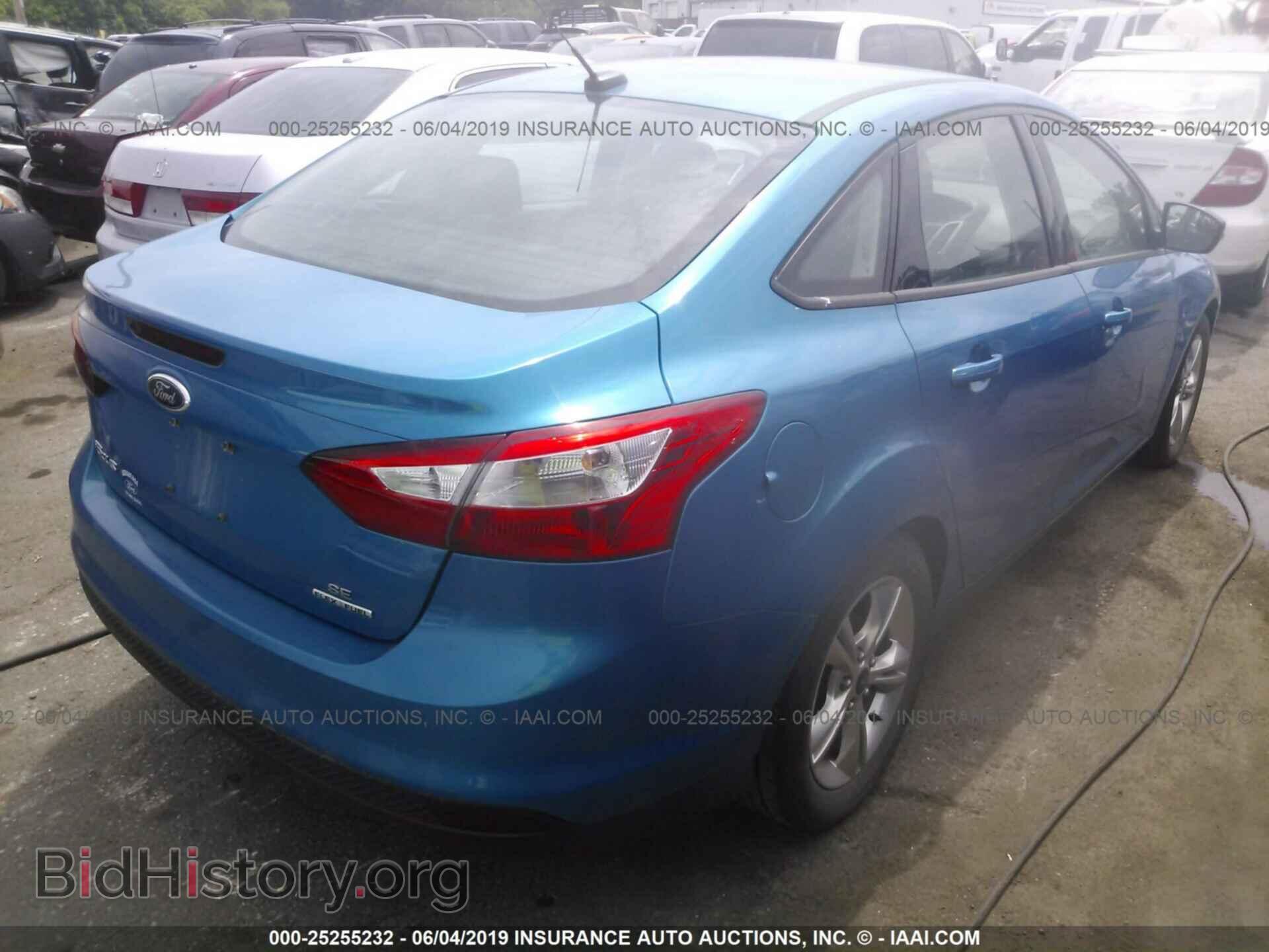 2014 FORD FOCUS - VIN: 1FADP3F24EL168906 - Photo 4