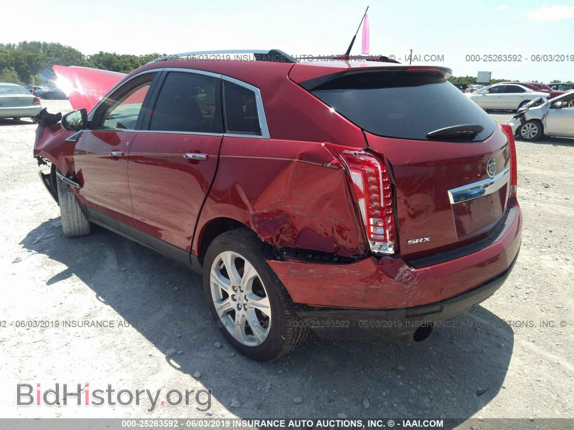 2014 CADILLAC SRX - VIN: 3GYFNCE35ES624497 - Фото 3