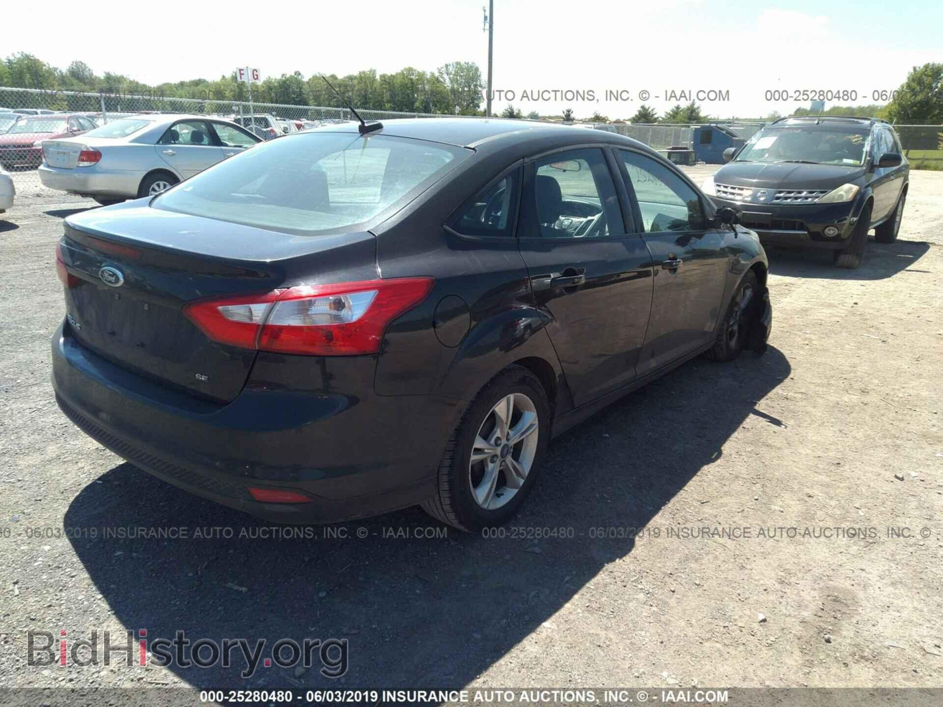 2014 FORD FOCUS - VIN: 1FADP3F23EL136285 - Photo 4