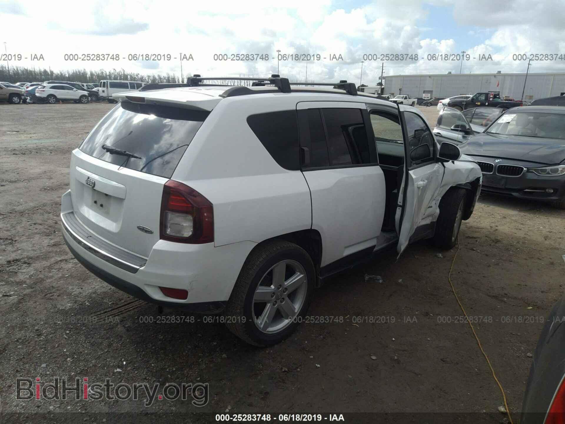 2014 JEEP COMPASS - VIN: 1C4NJCEA4ED831247 - Photo 4