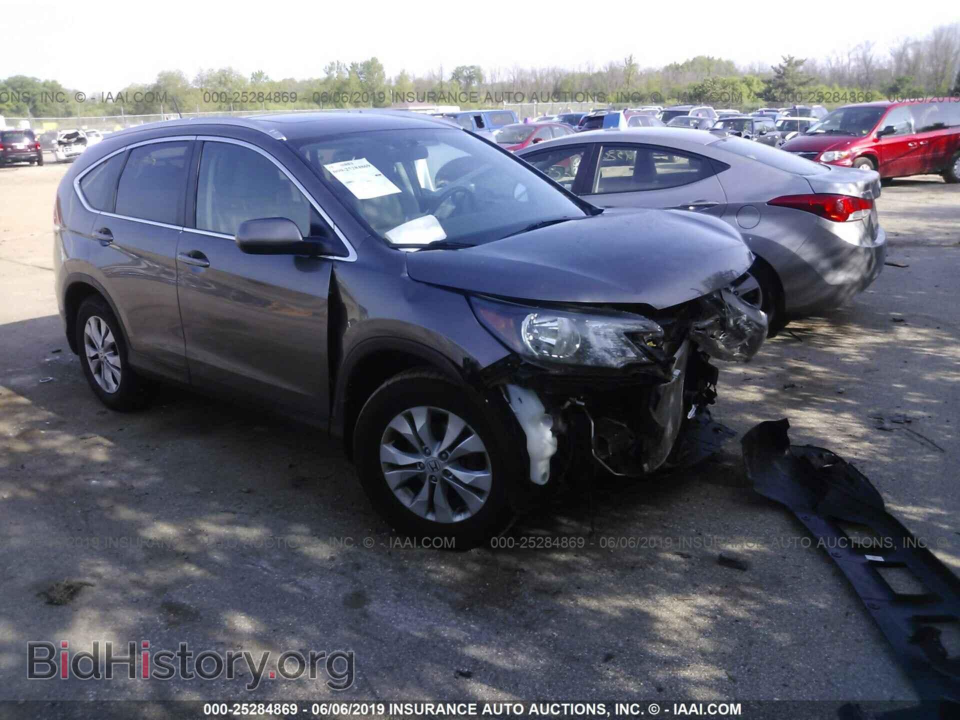 Фотография 2HKRM4H74EH638346 - HONDA CR-V 2014
