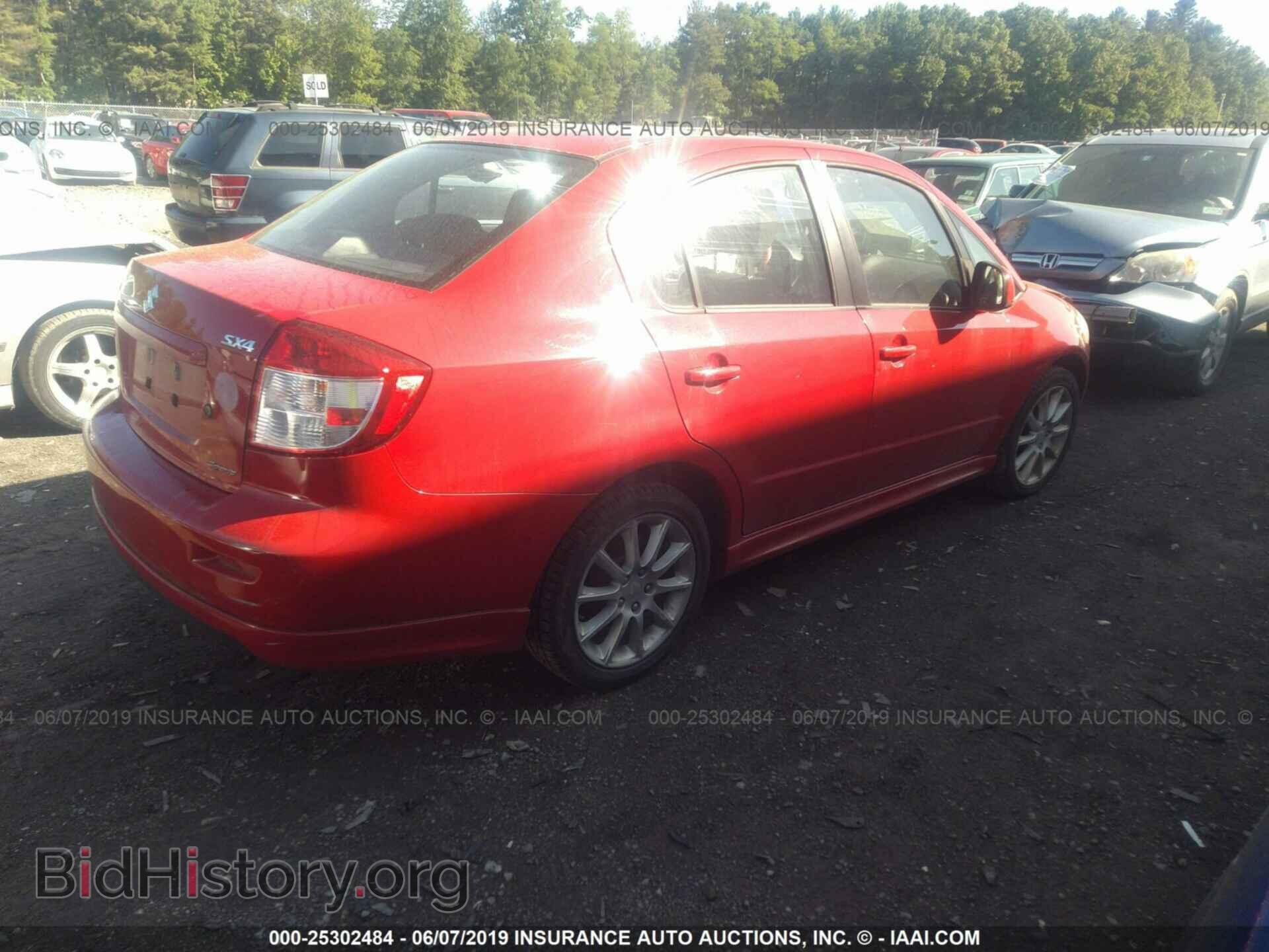 2011 SUZUKI SX4 - VIN: JS2YC5A41B6300516 - Фото 4