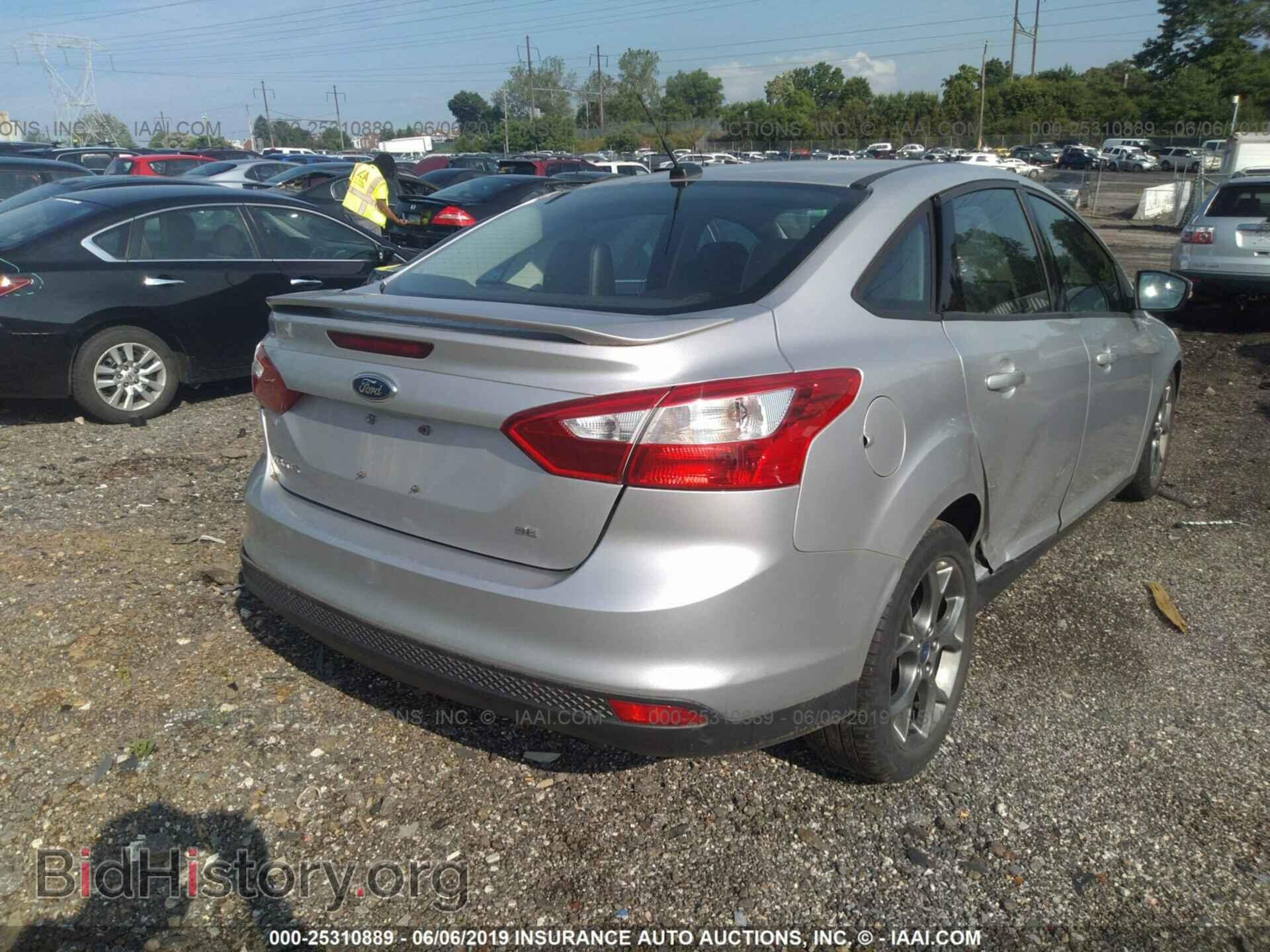 2014 FORD FOCUS - VIN: 1FADP3F2XEL214965 - Photo 4