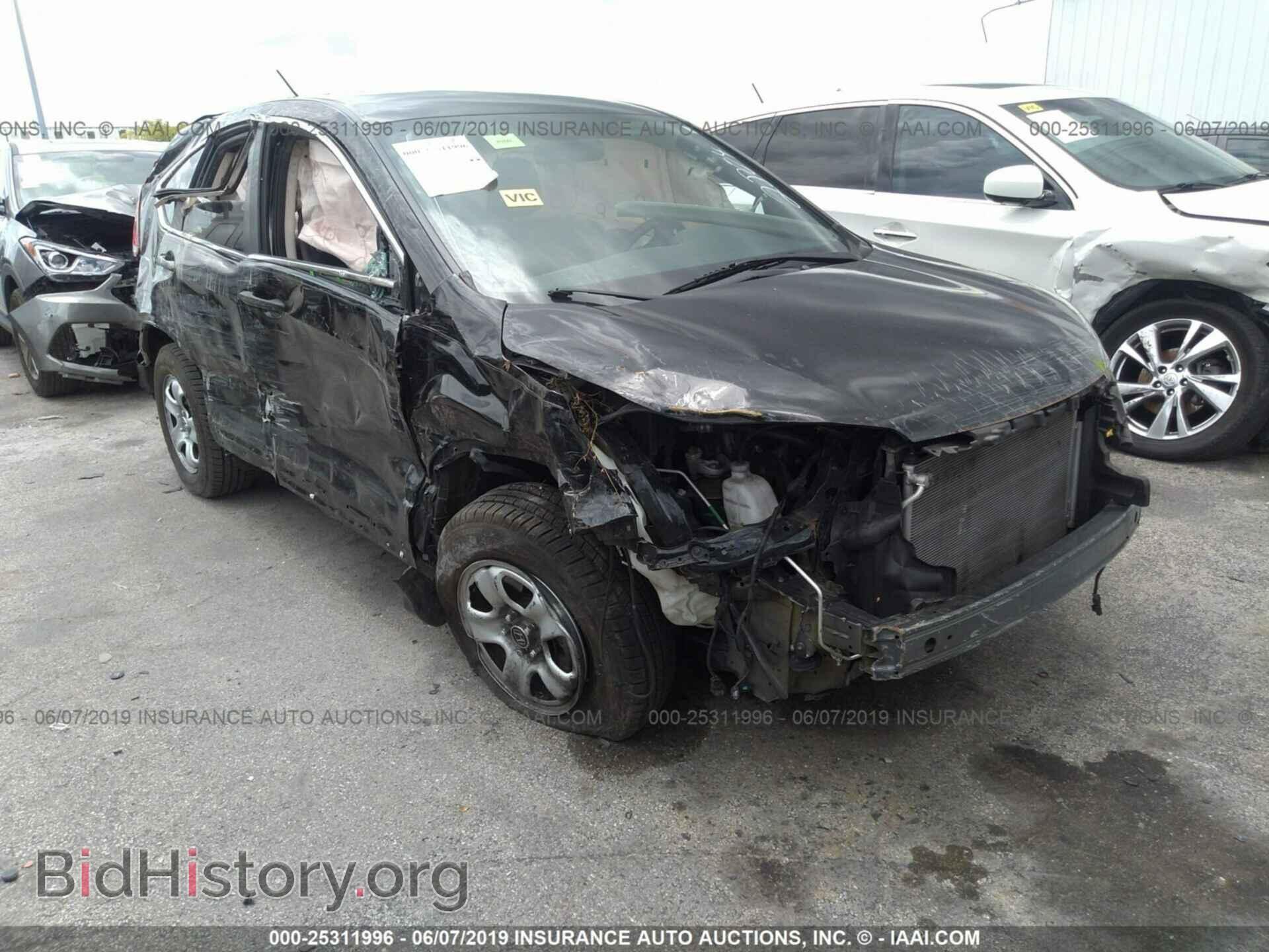 Фотография 3CZRM3H38EG702804 - HONDA CR-V 2014