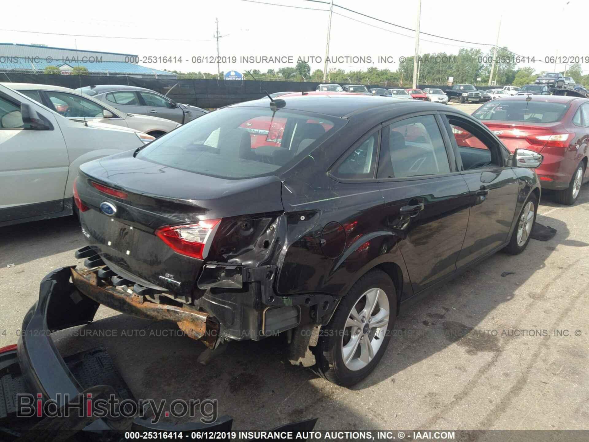 2014 FORD FOCUS - VIN: 1FADP3F2XEL347113 - Photo 4