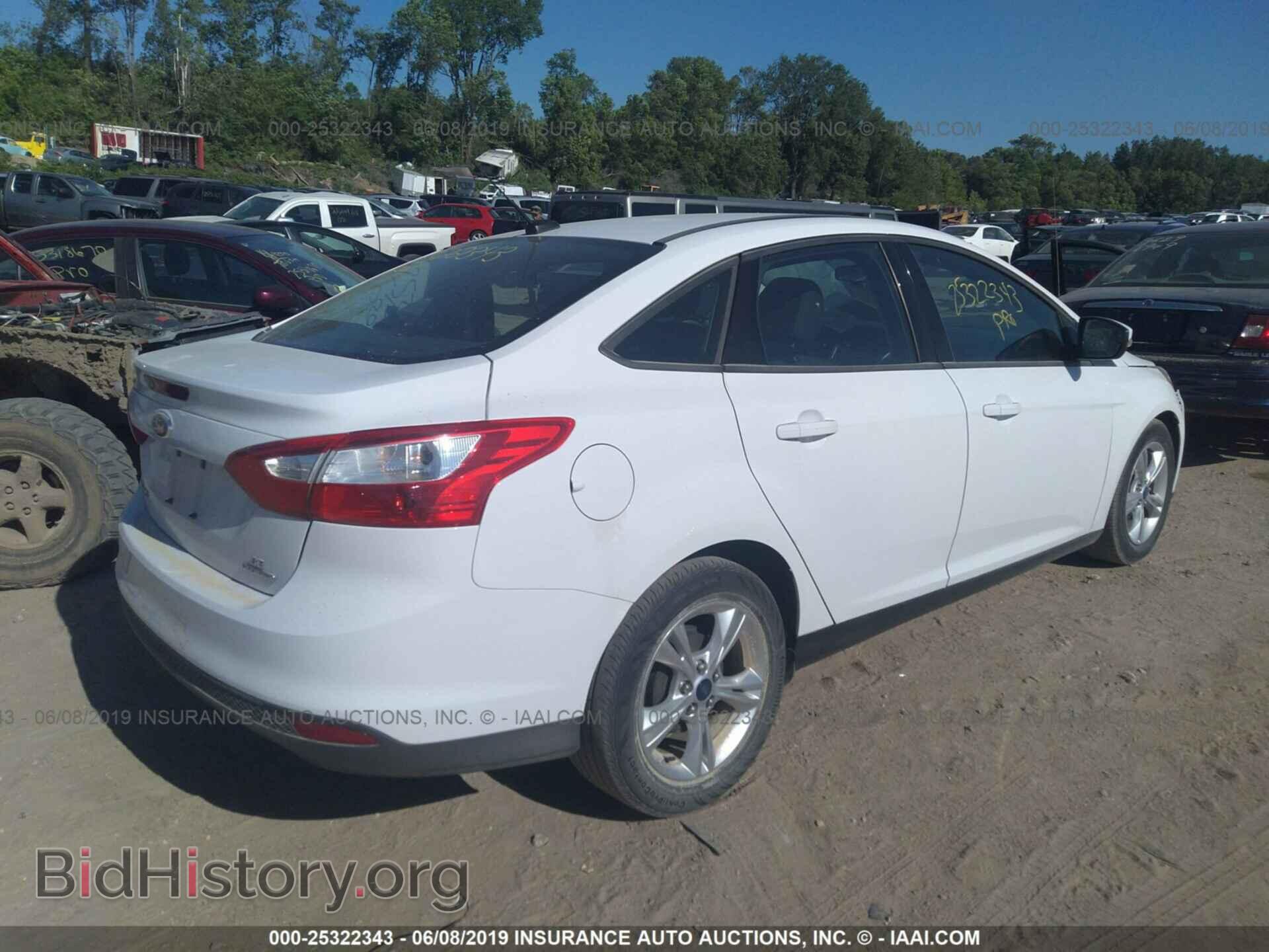 2014 FORD FOCUS - VIN: 1FADP3F21EL144093 - Photo 4