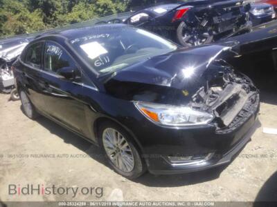 2016 Ford FOCUS TITANIUM, black — VIN 1FADP3J2XGL211672, IAAI
