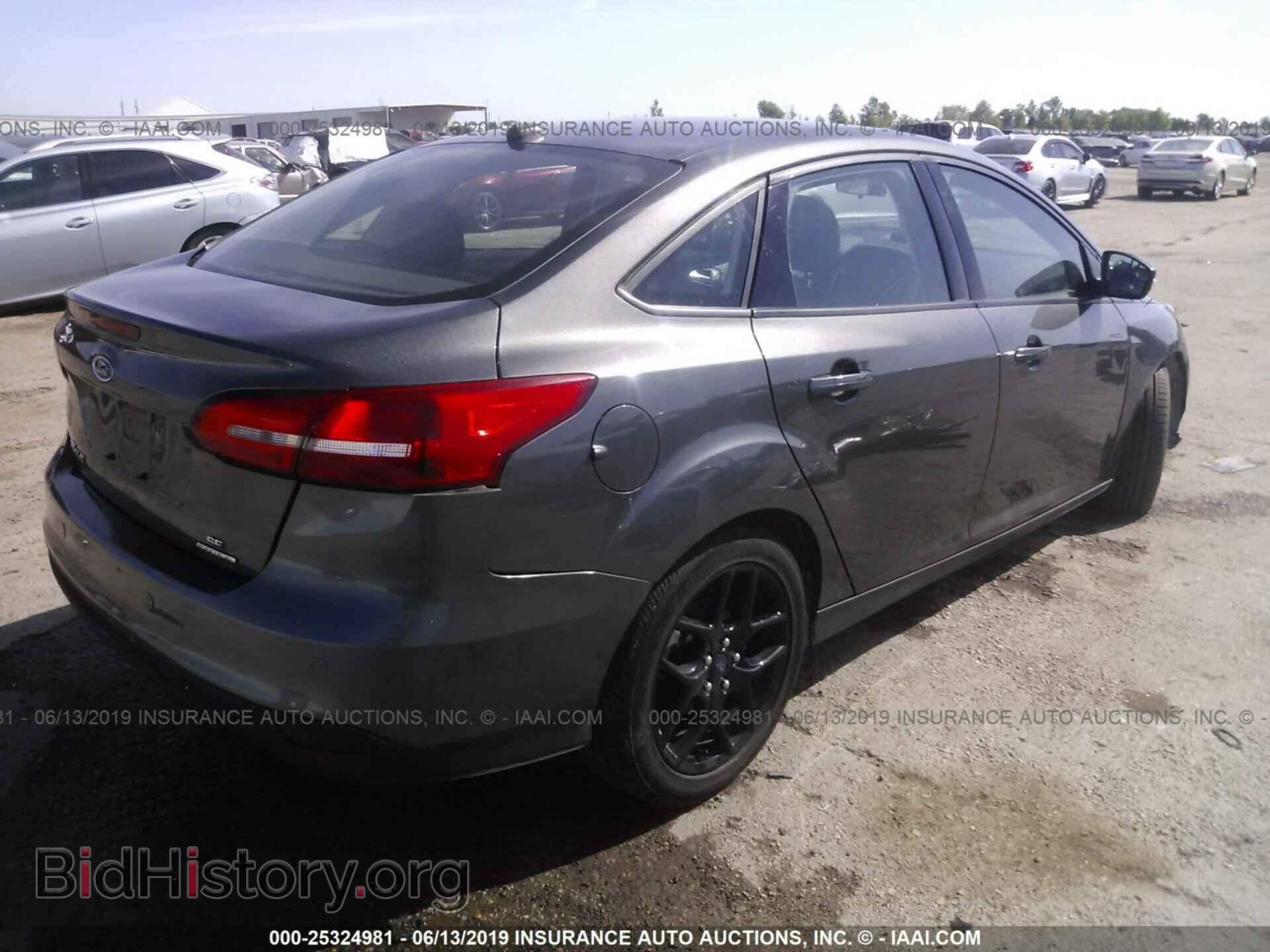 2016 FORD FOCUS - VIN: 1FADP3F20GL242812 - Photo 4