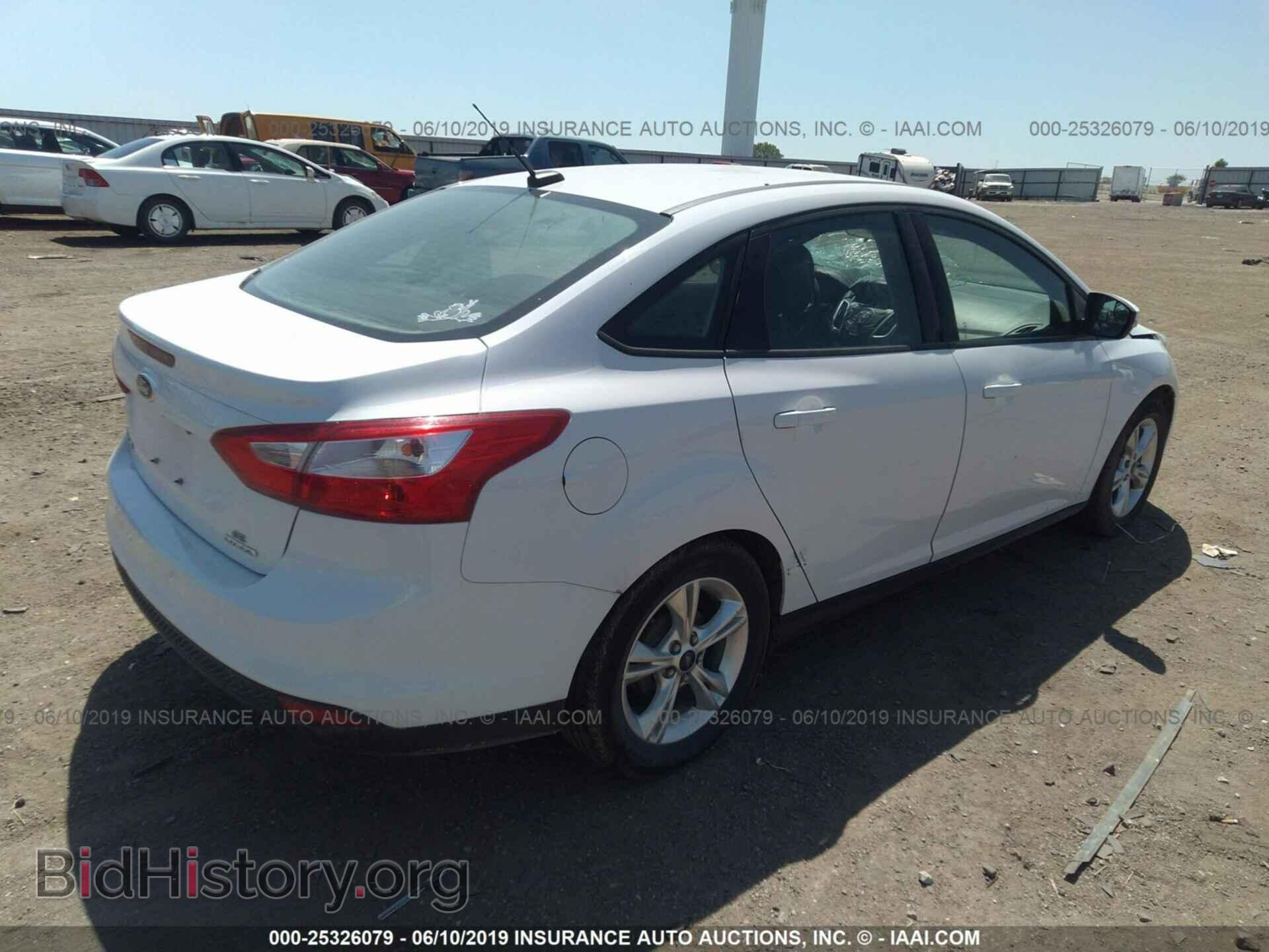 2014 FORD FOCUS - VIN: 1FADP3F29EL400075 - Photo 4