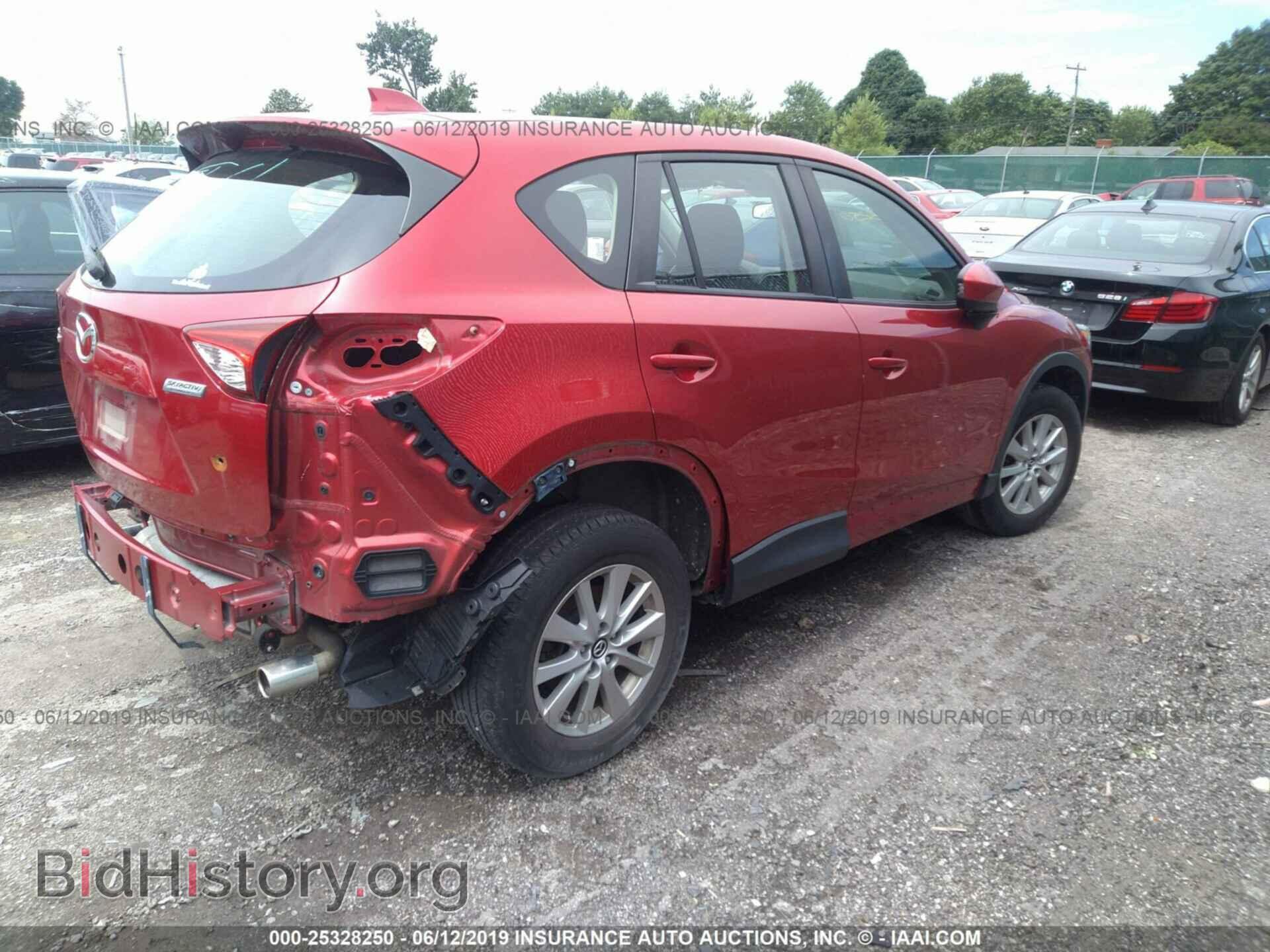 2015 MAZDA CX-5 - VIN: JM3KE2BEXF0452925 - Фото 4