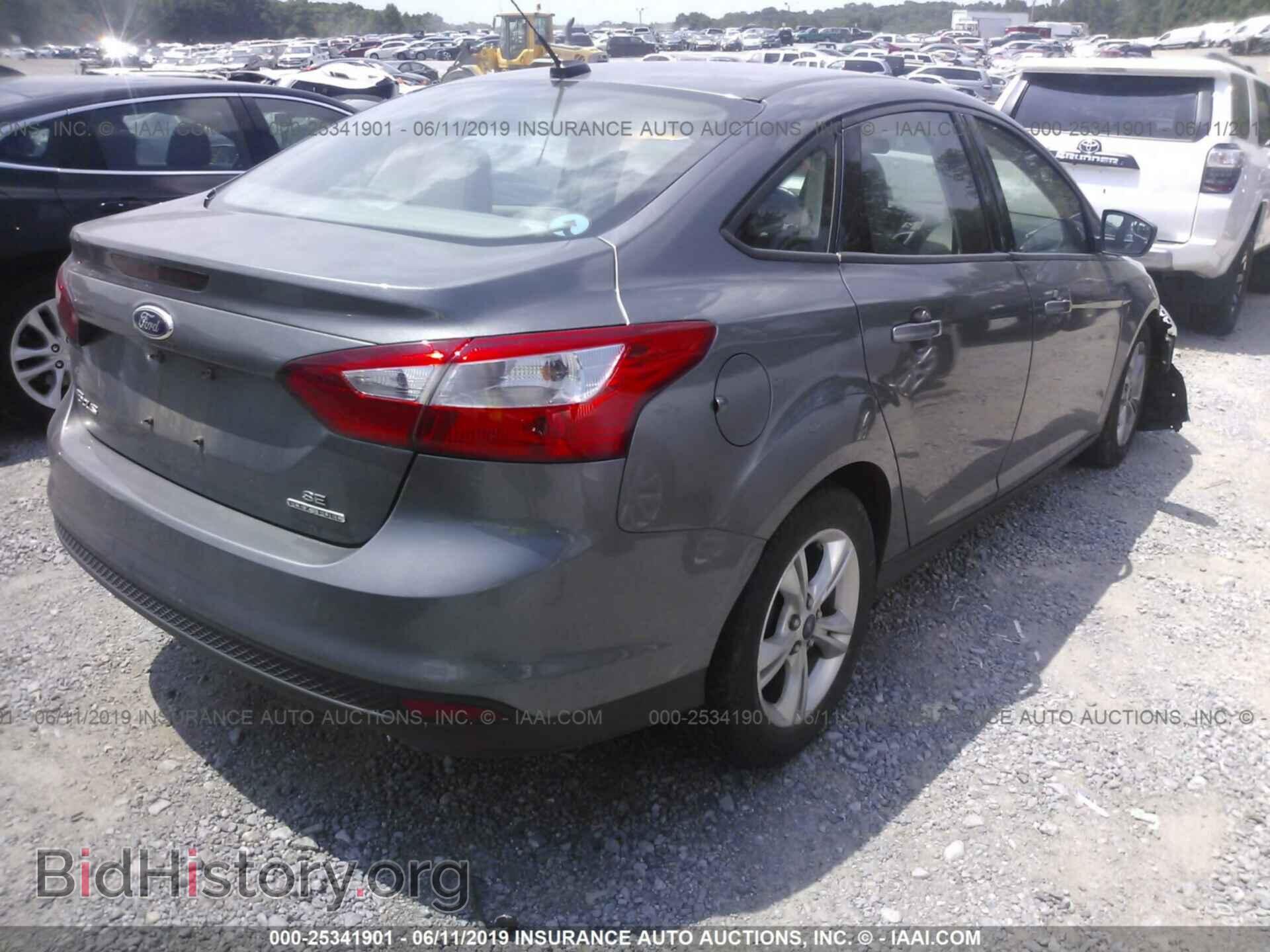 2014 FORD FOCUS - VIN: 1FADP3F21EL298061 - Photo 4
