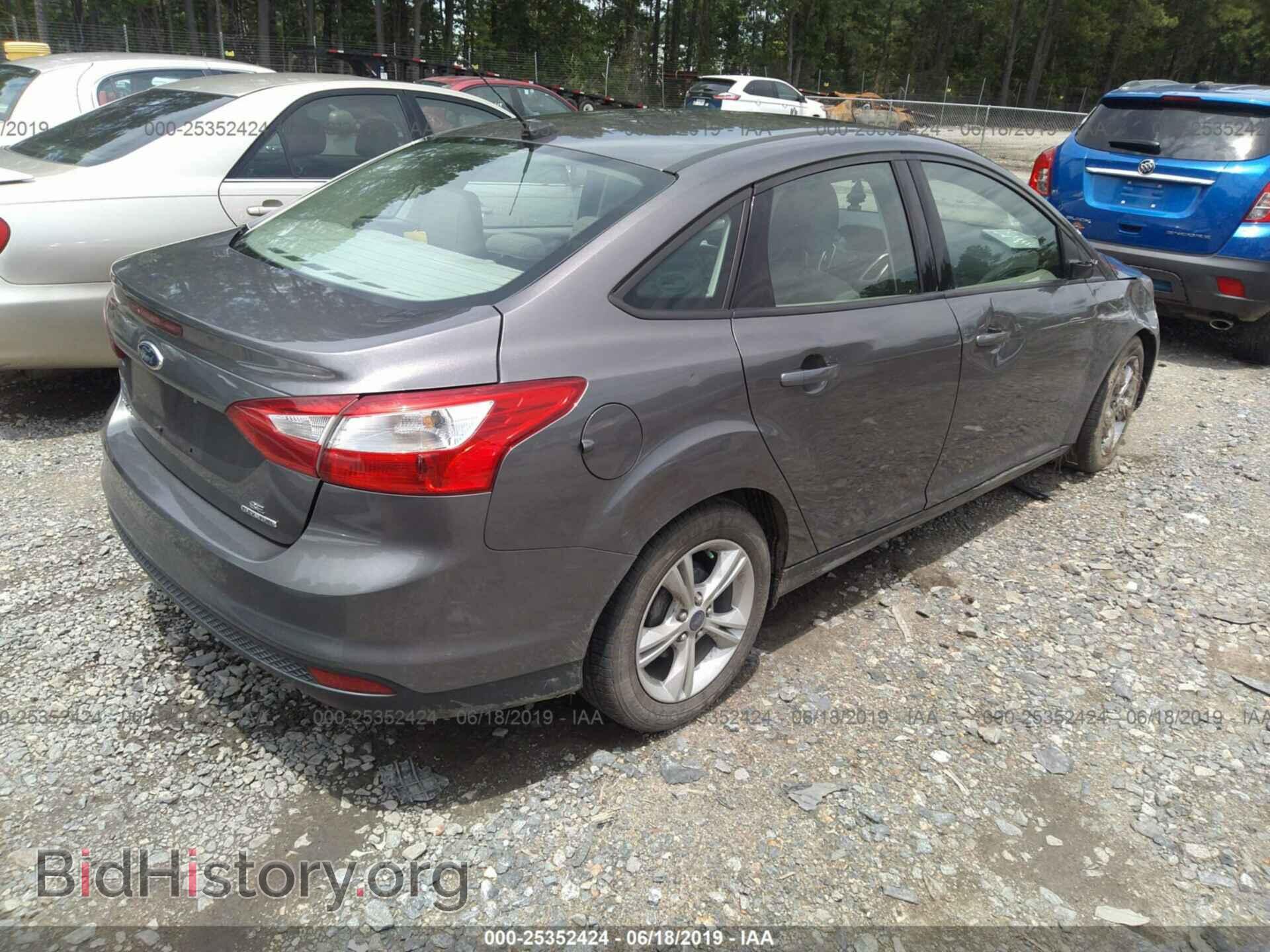 2014 FORD FOCUS - VIN: 1FADP3F2XEL457837 - Photo 4