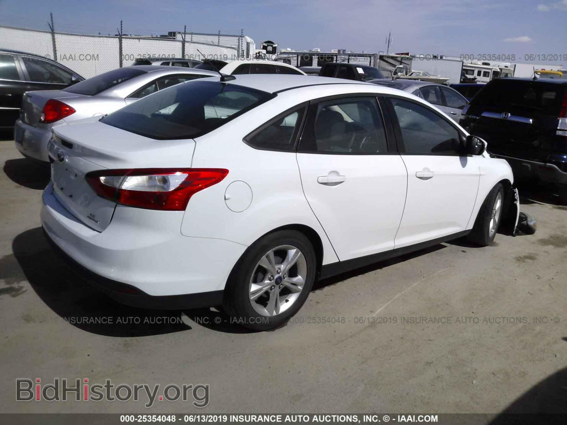 2014 FORD FOCUS - VIN: 1FADP3F22EL138092 - Photo 4