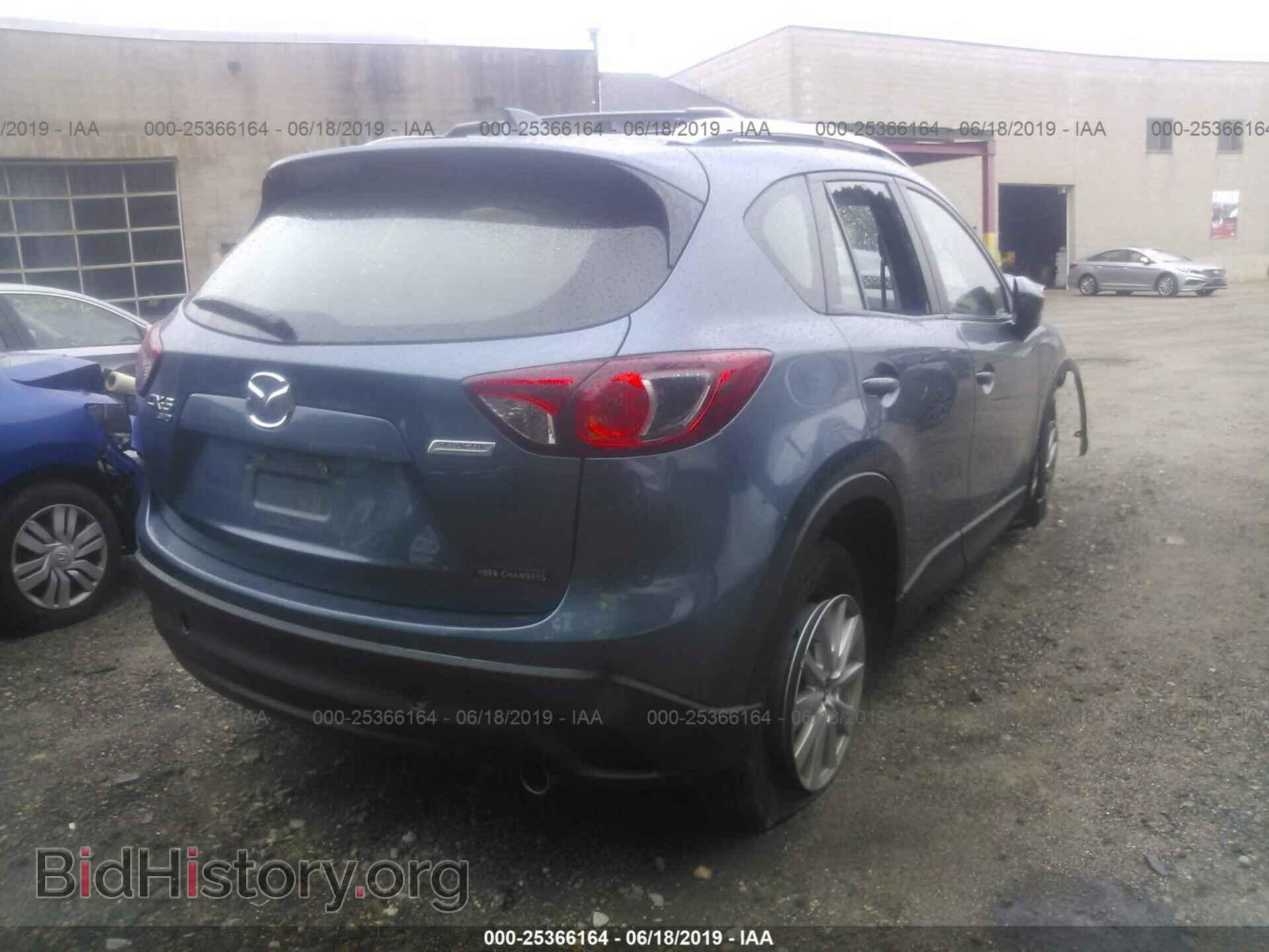 2014 MAZDA CX-5 - VIN: JM3KE4BE9E0416055 - Фото 4
